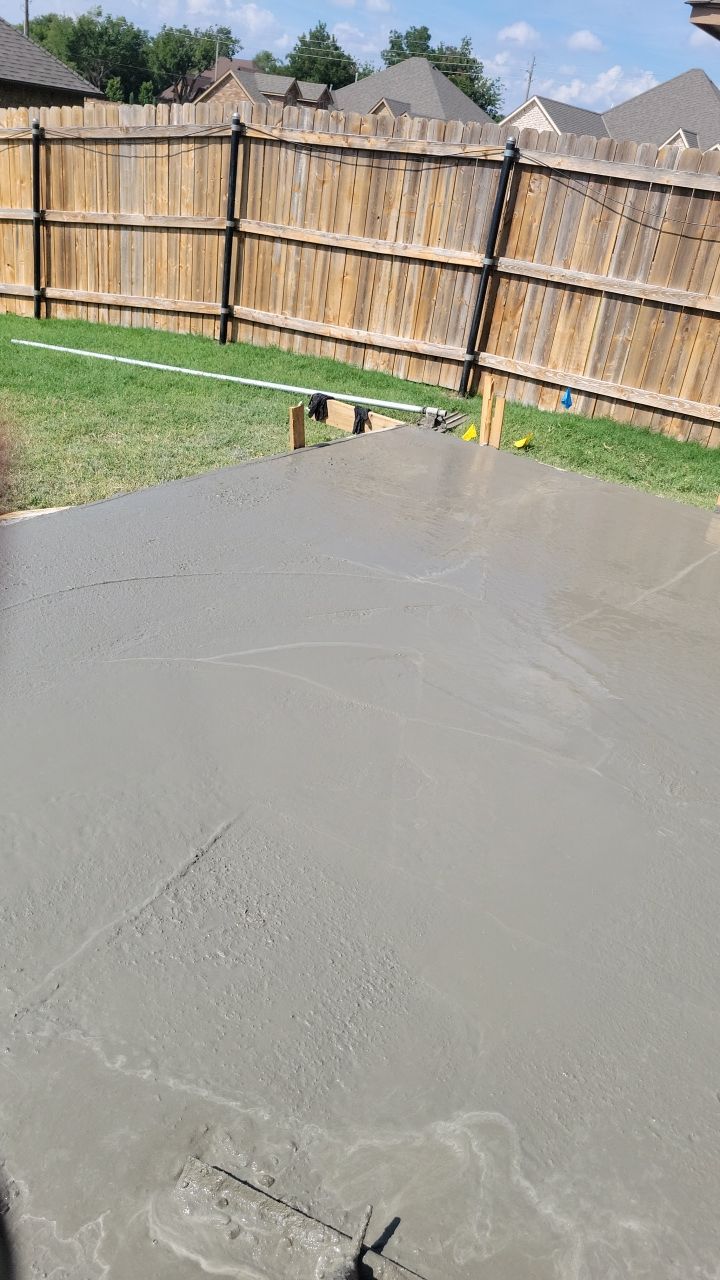 Concrete slab with Pergola by Clays Services Inc