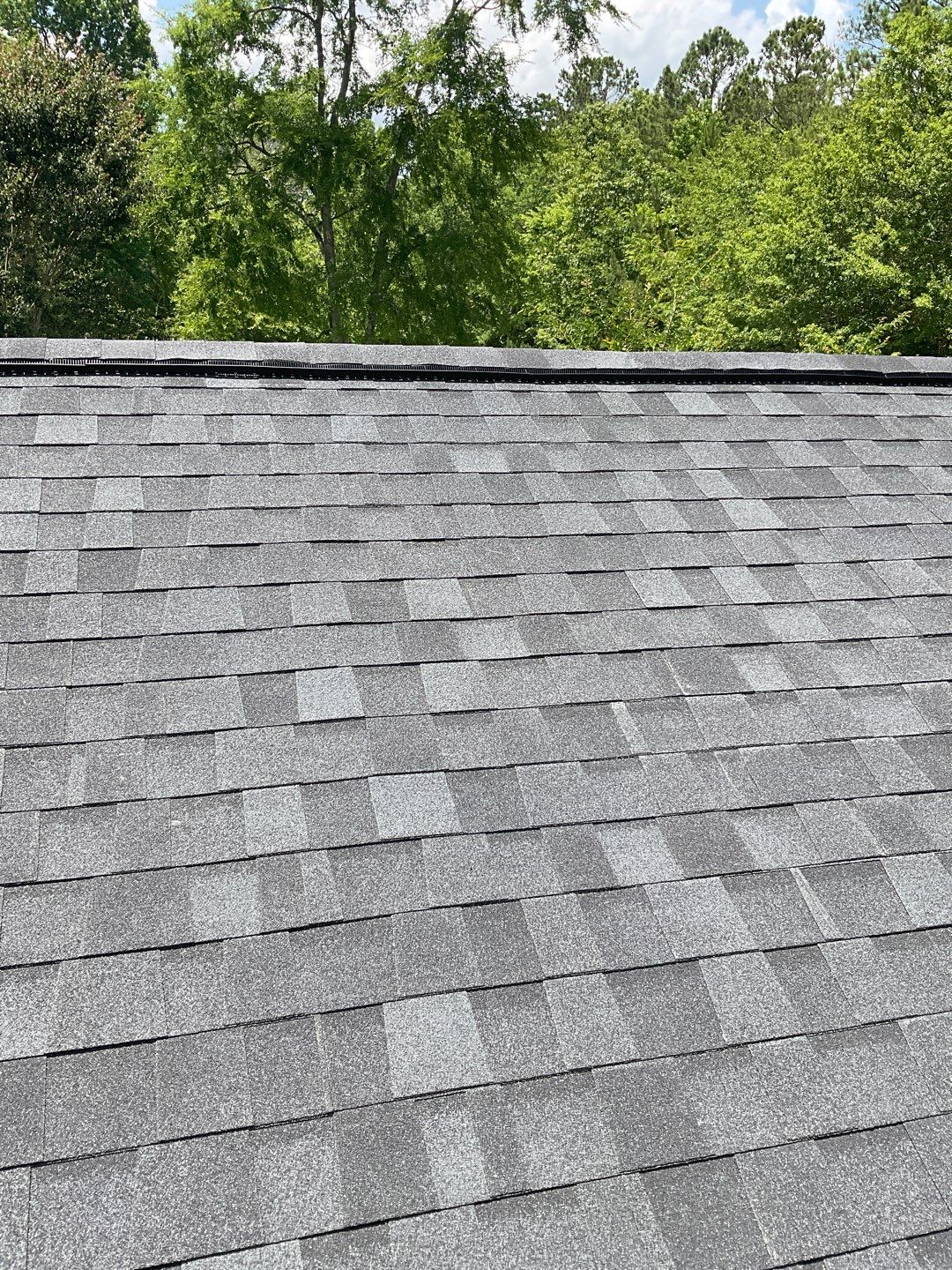 Residential Roofing Installation using Tamko Heritage lifetime shingle in Rustic Black by Sands Roofing & Construction