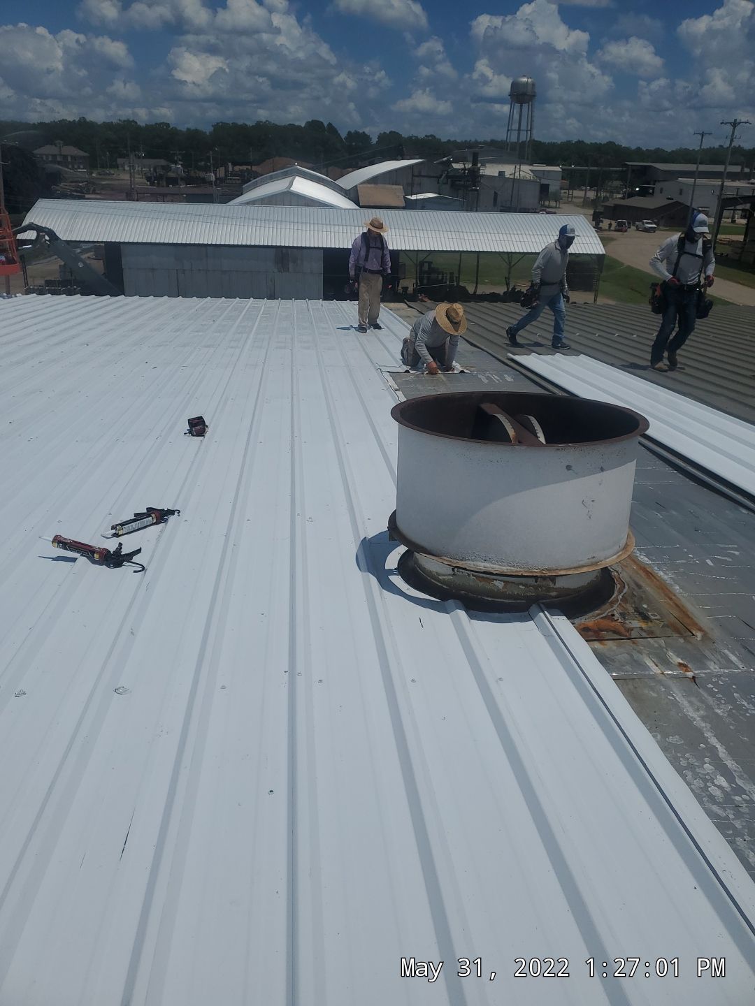 Commercial Roofing Installation using Aluminum Roofing panels by Hostetler Roofing