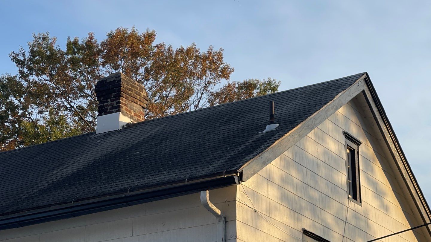 Onyx Black Shingles by Reimagine Roofing