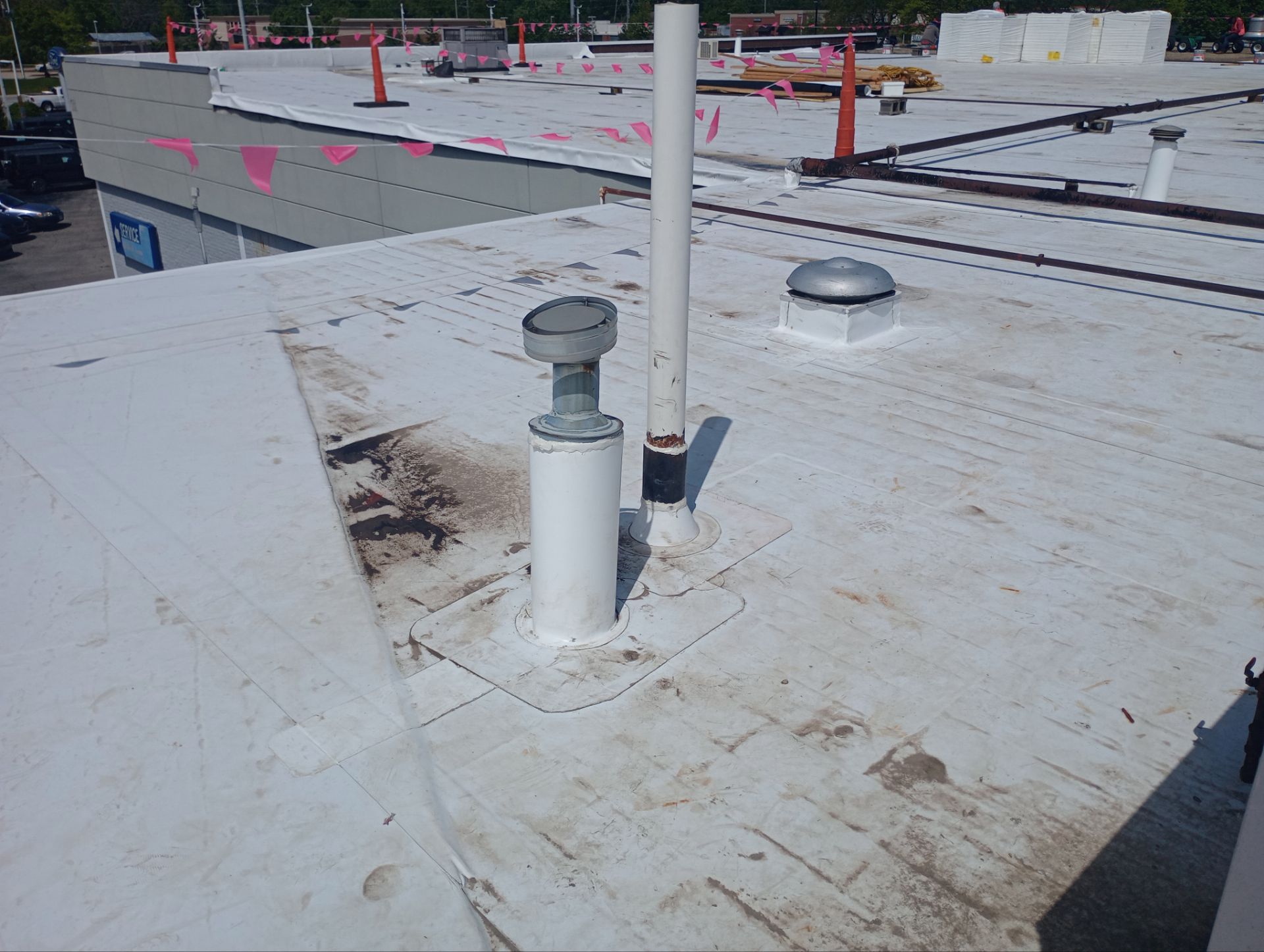 Ford Dealership - Re-Roof by Pink Roofing