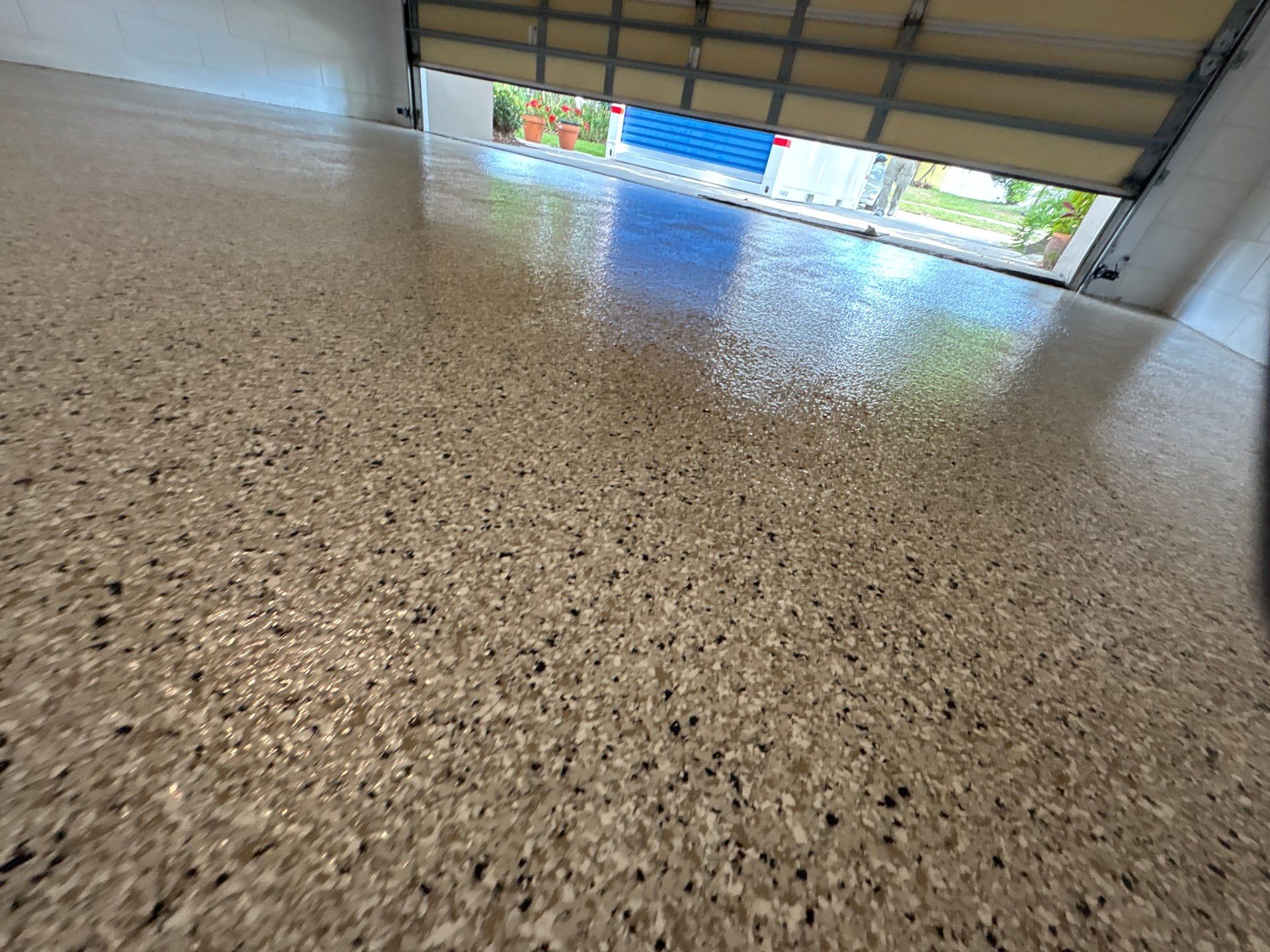 Garage and Screened Lanai Epoxy Floor Coating in Brandon by Performance Floors & Coating
