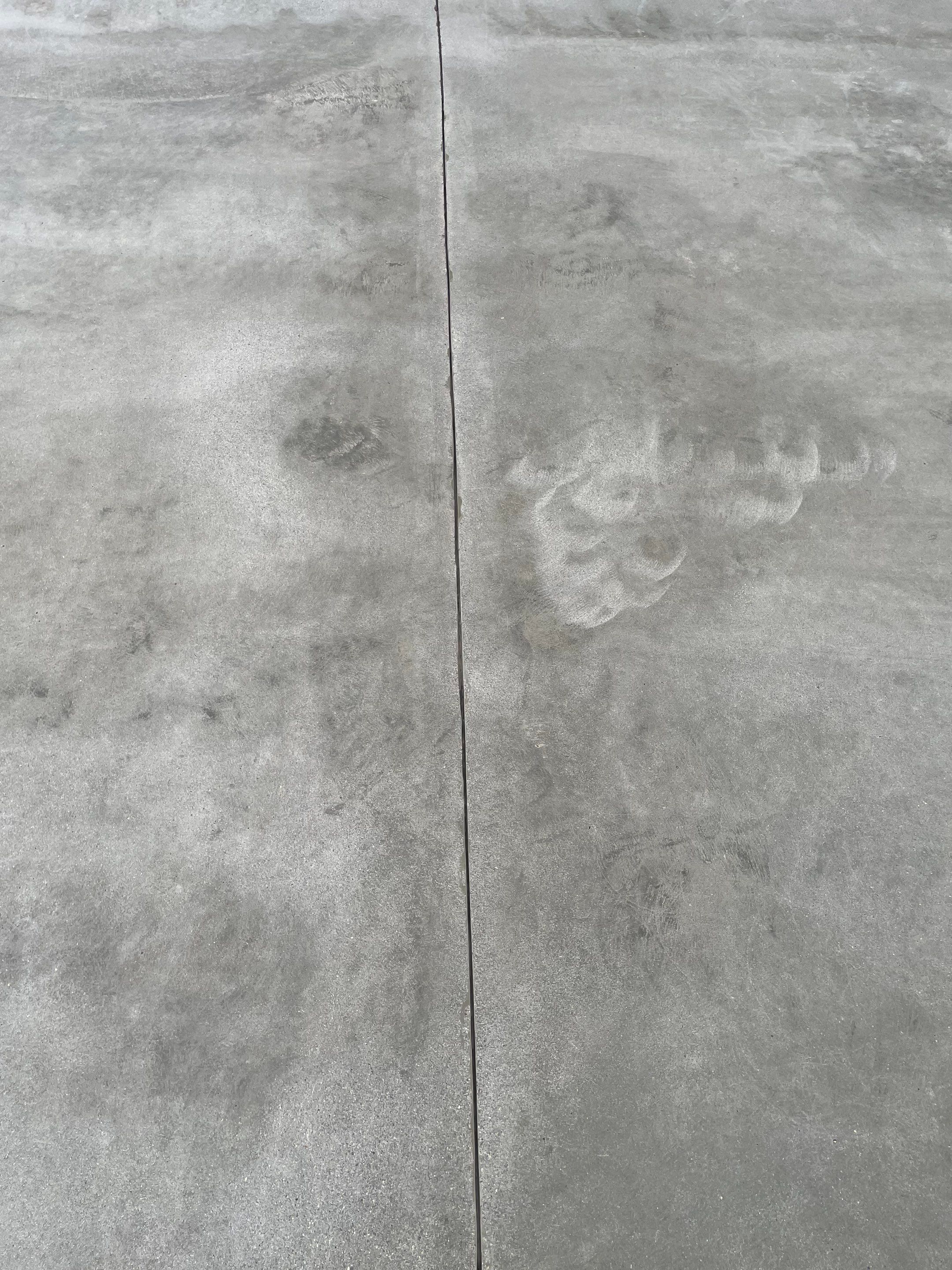 Sioux Falls Garage Floor Transformation with Cabin Fever Decorative Chips by Select Painting, Coatings & Garage Cabinets