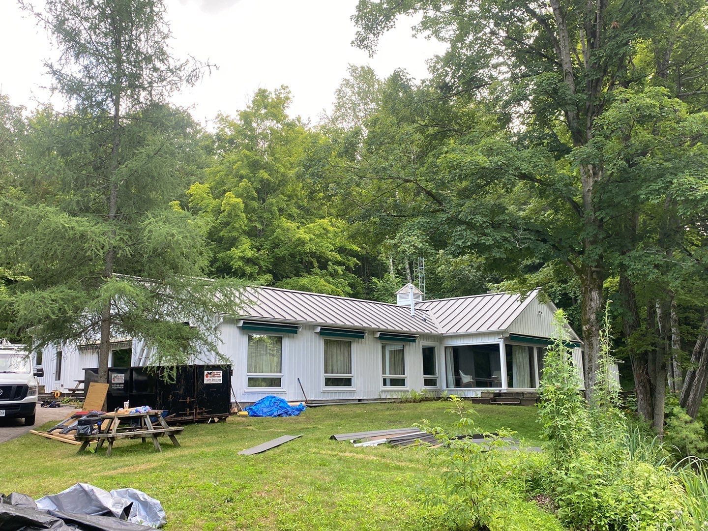 Residential Roofing Installation using 24 Ga Standing Seam Meta by Jay Carter Roofing & Sheet Metal