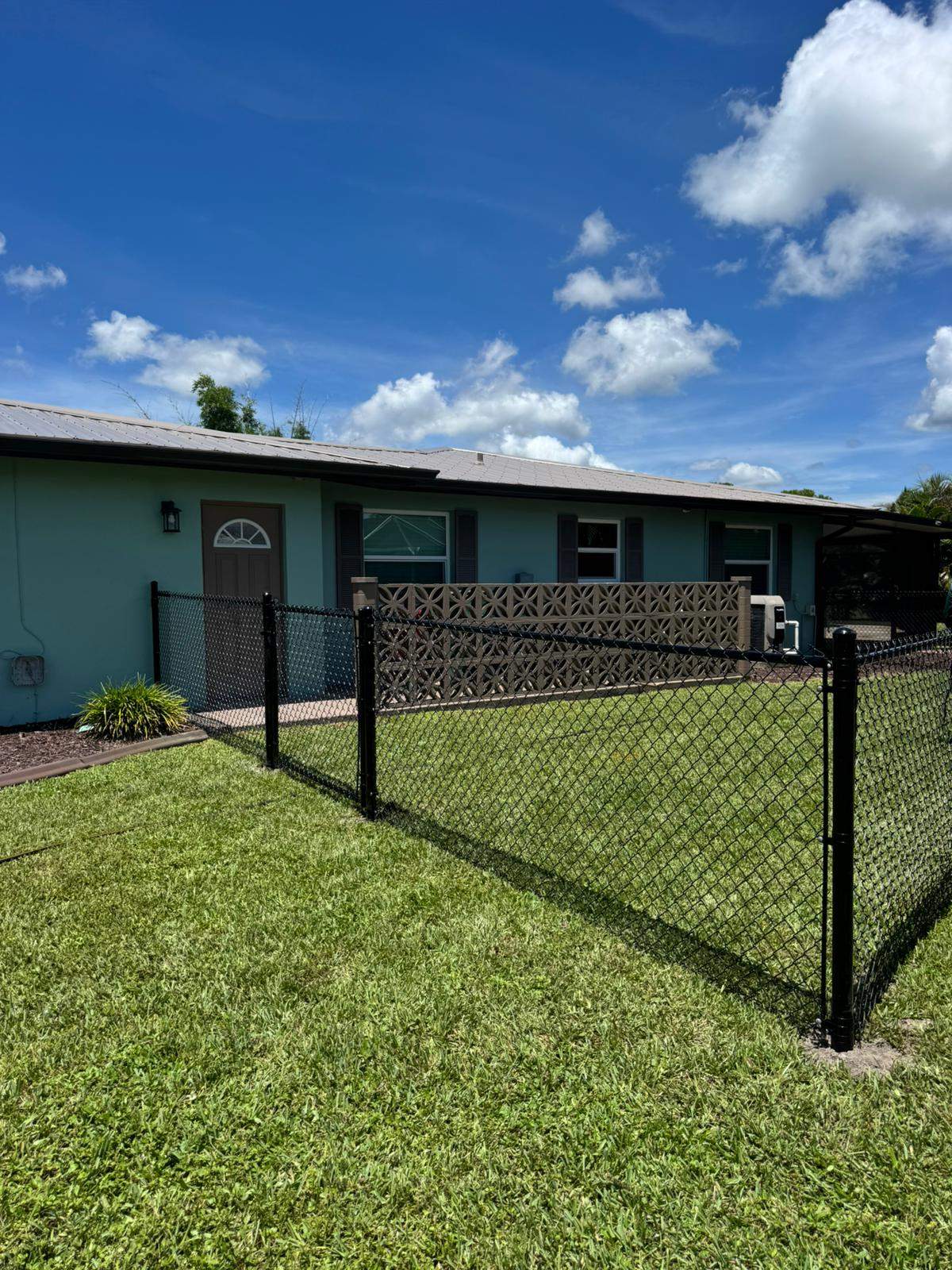 Black Chain Link Fence and Gate Installation in Rotonda West by True Fence LLC