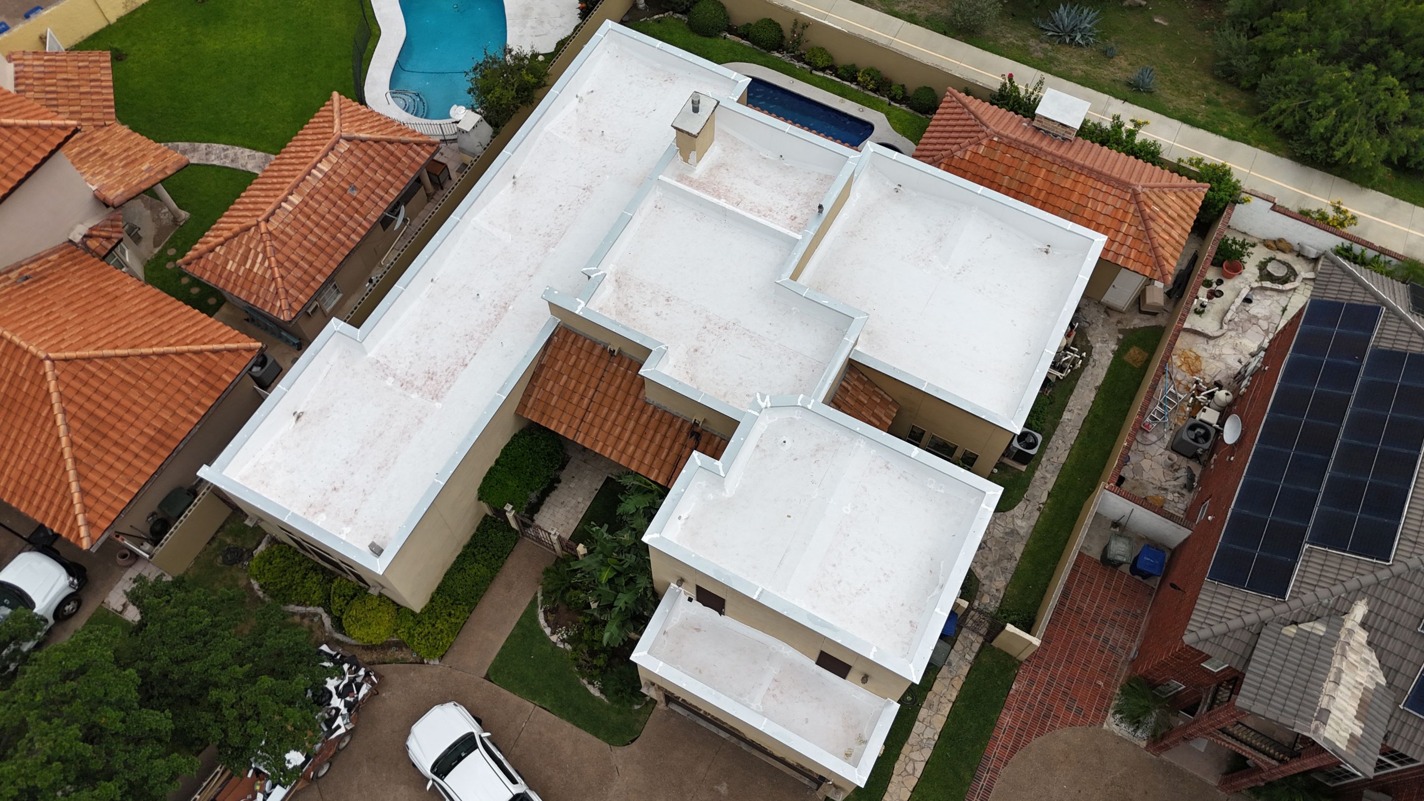 Flat Roof Replacement by JM Flores Roofing & Construction, Inc