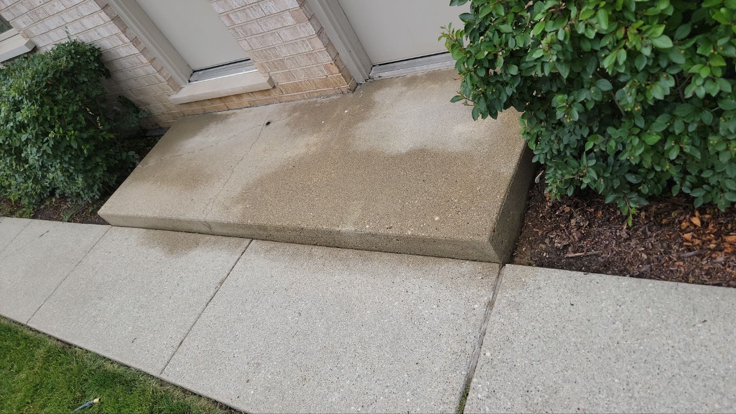 concrete power washing Algaecide, soft wash soap by Northern Power Washing LLC.