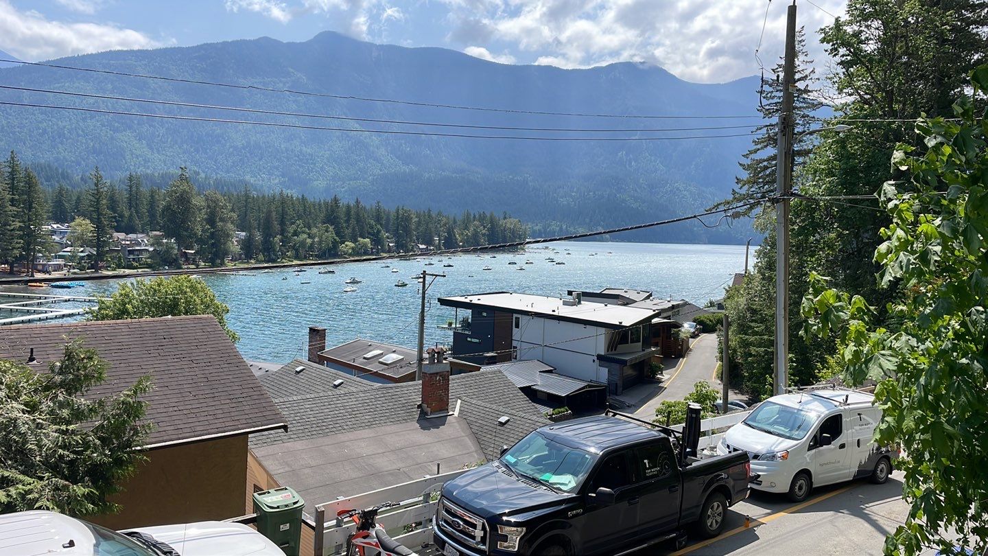 Small patio roof with 2ply sbs  by Top Notch Roofing Inc