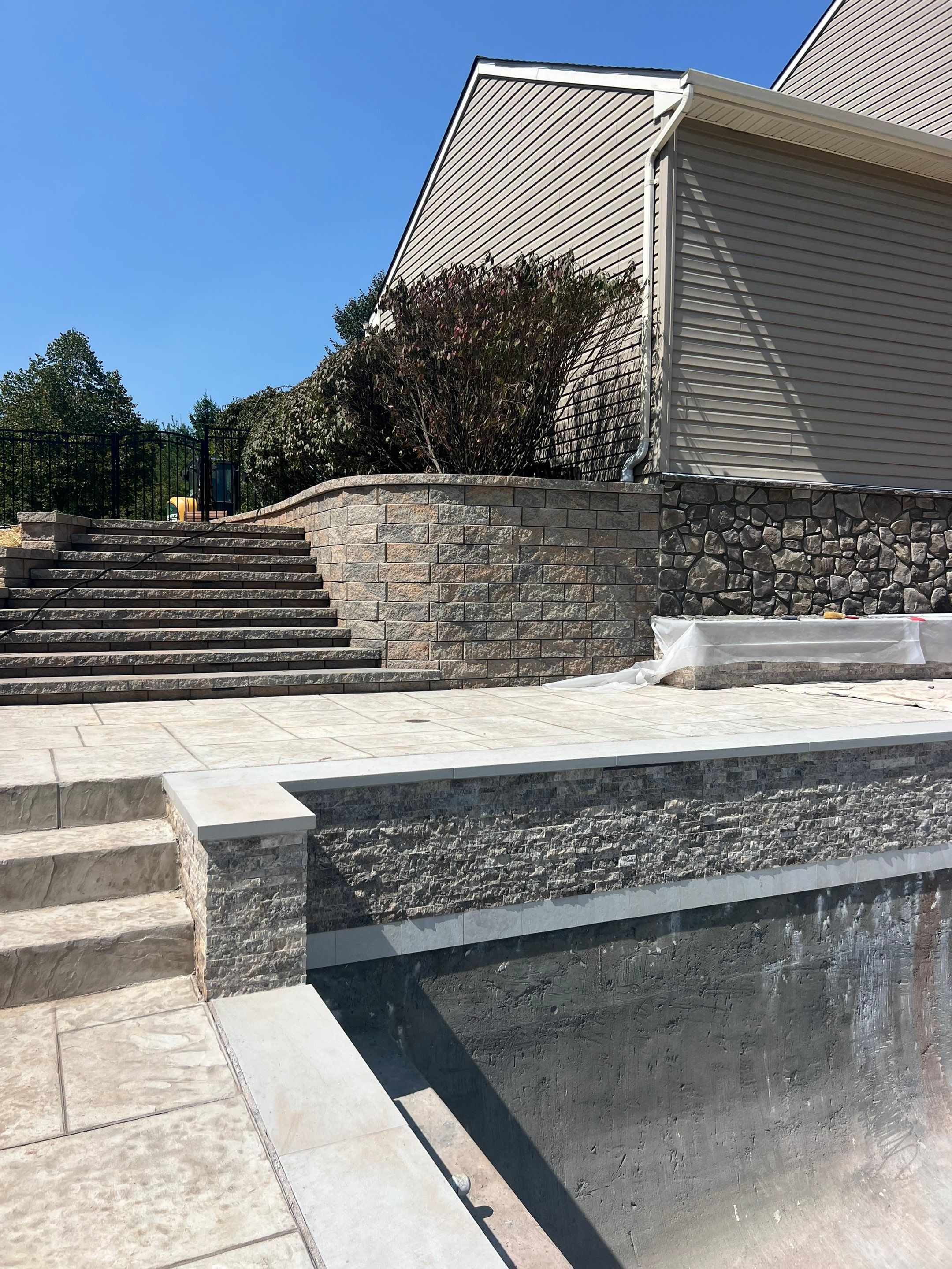 Modern Stamped Concrete Pool Deck by Architectural Concrete Design