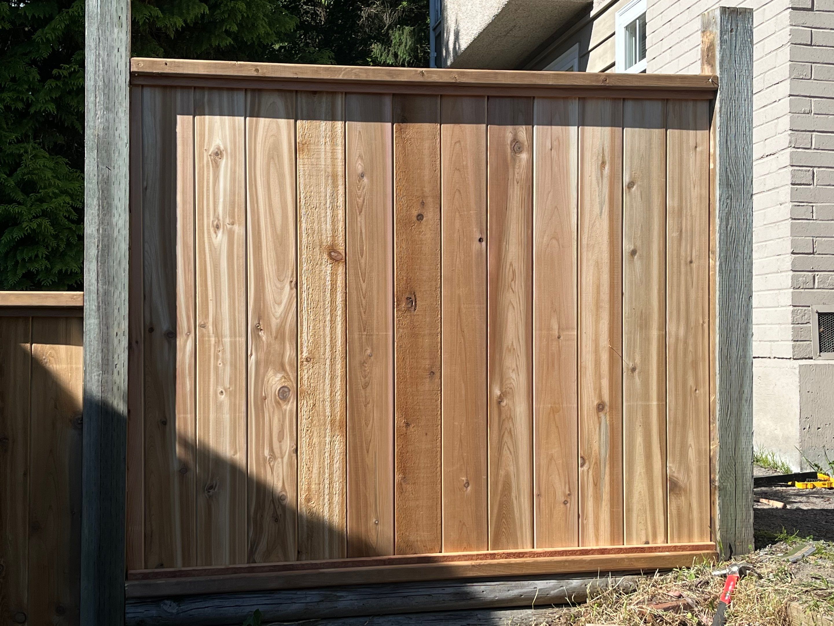 New Fence Installation - Edgemont Village by YVR Construction Group