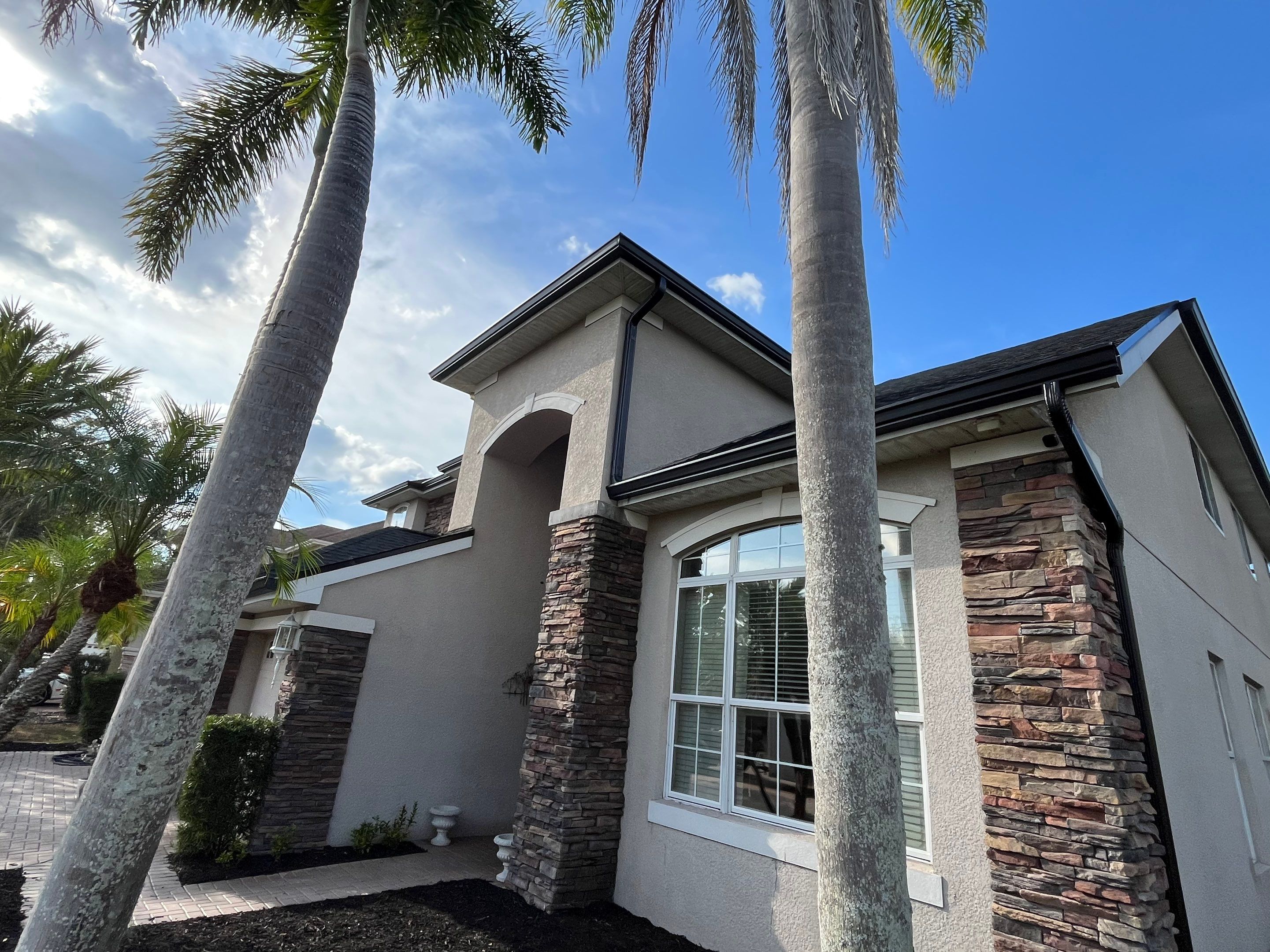 Black 6-inch Seamless Gutters for Modern Ellenton Homes FL by Gutter Professors