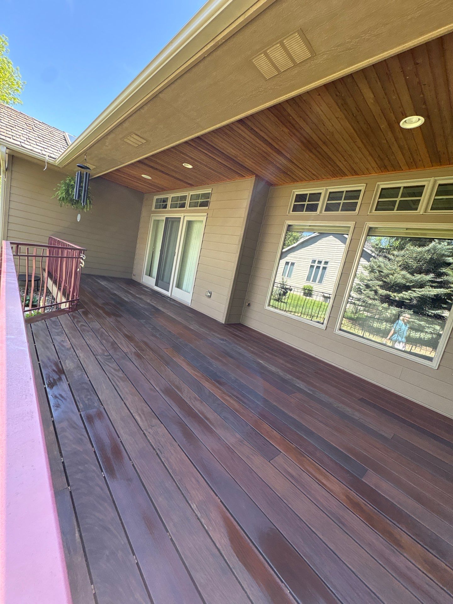 Deck Staining and Tongue and Groove Ceiling Refinish in Sioux Falls by Select Painting, Coatings & Garage Cabinets