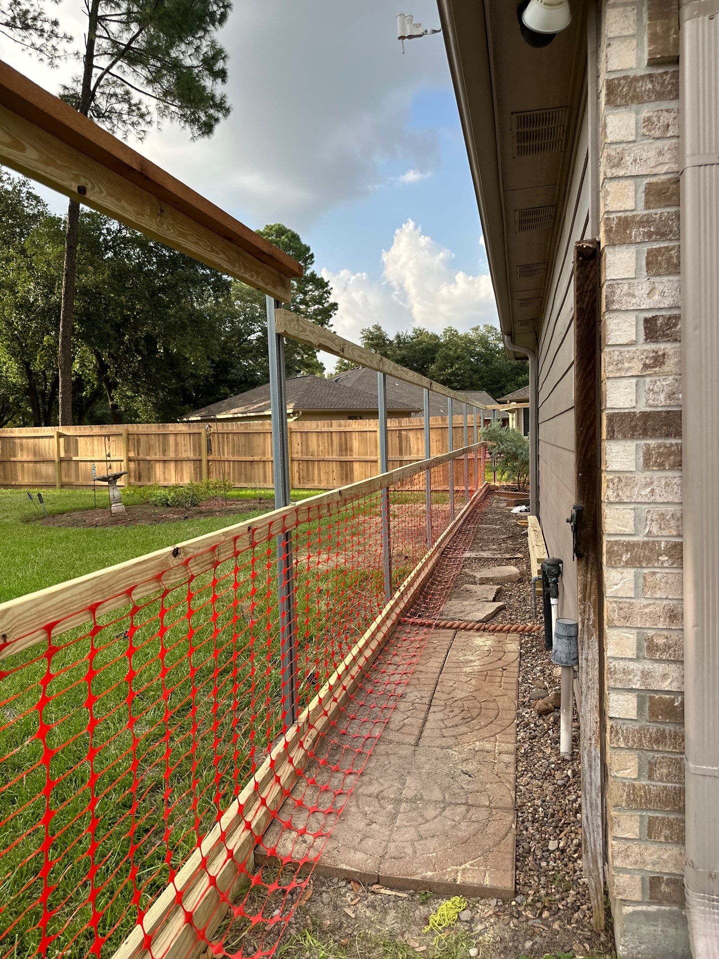 Wood fence project in Cypress by Tim's Fences