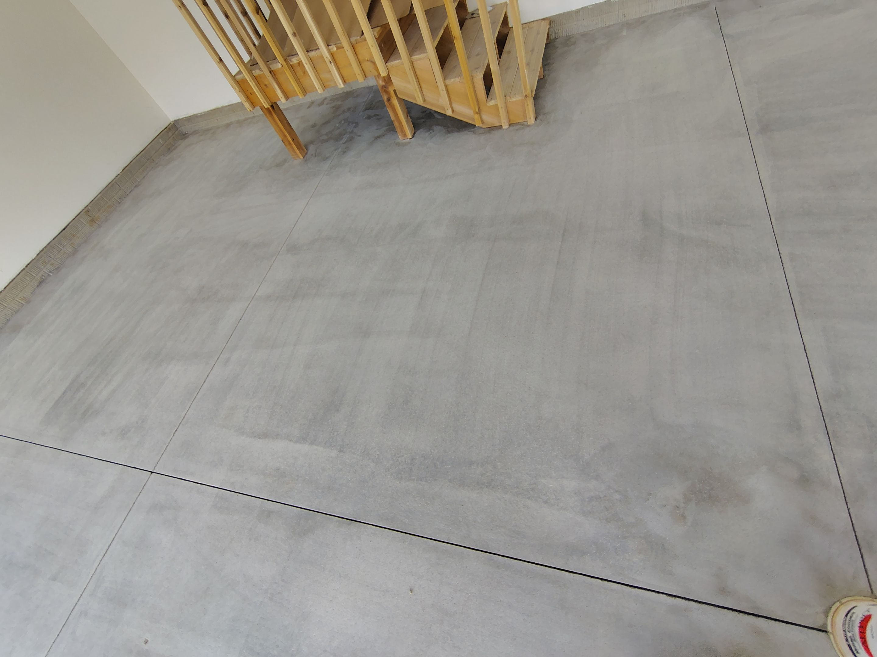 Sioux Falls Garage Floor Transformation with Gray Decorative Flake Coating by Select Painting, Coatings & Garage Cabinets