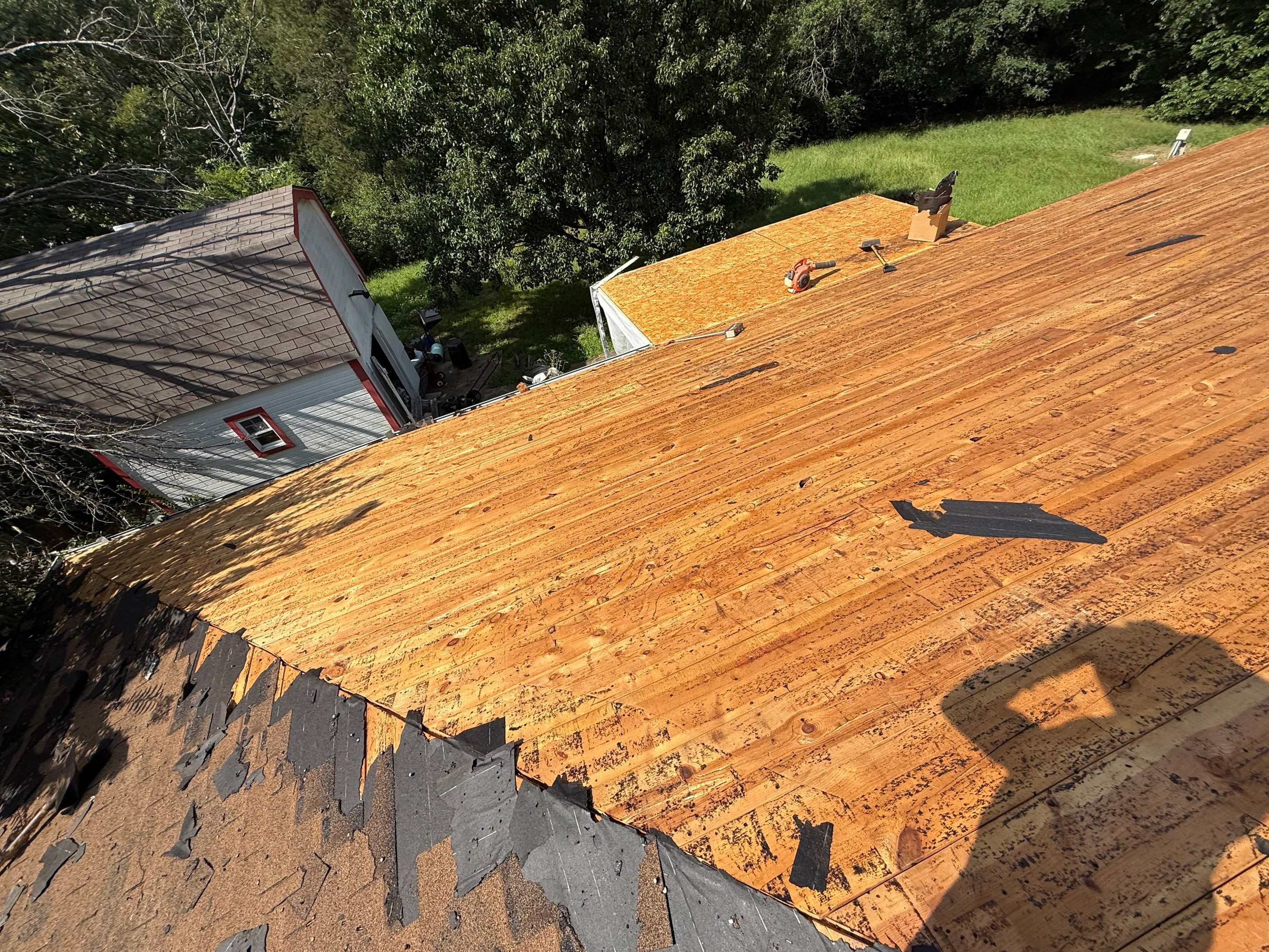 2 layers tear off & installation of new architectural shingles. by In & Out Construction & Remodeling, LLC