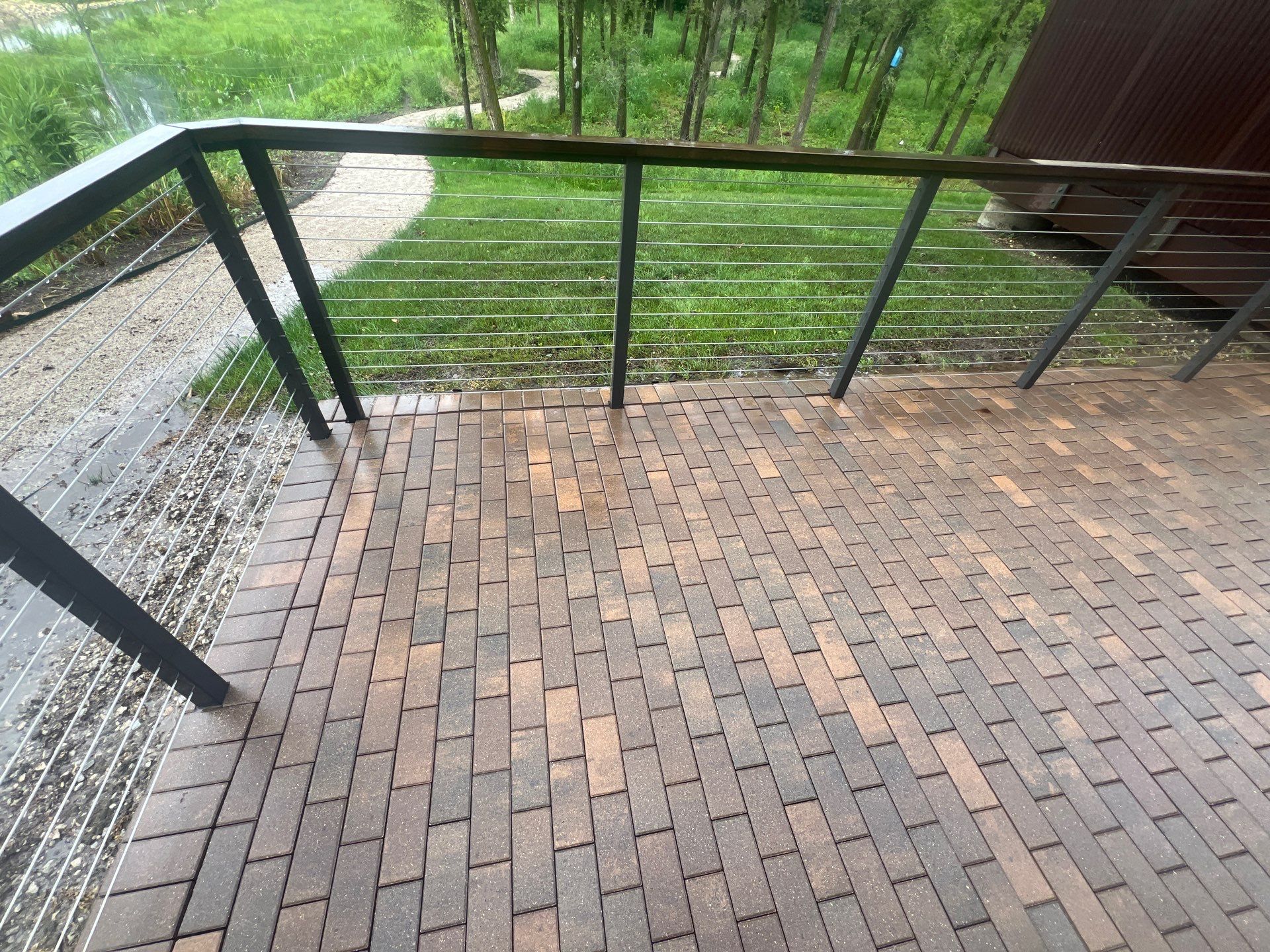 Brick paver repair, cleaning, sealing and poly sanding by Northern Power Washing LLC.