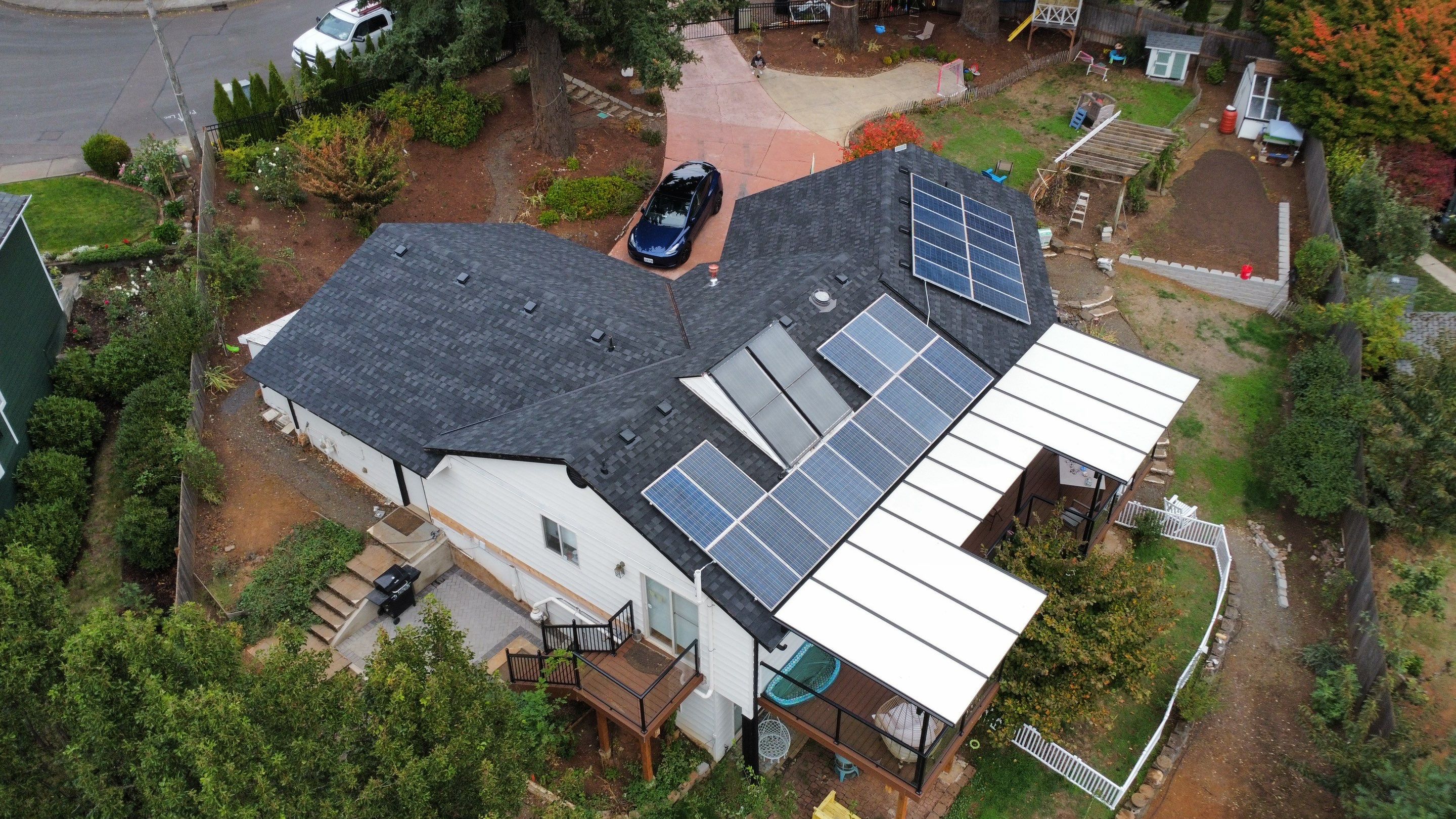 Granite Black Residential Roof Replacement by Orezona Building & Roofing Company, Inc.