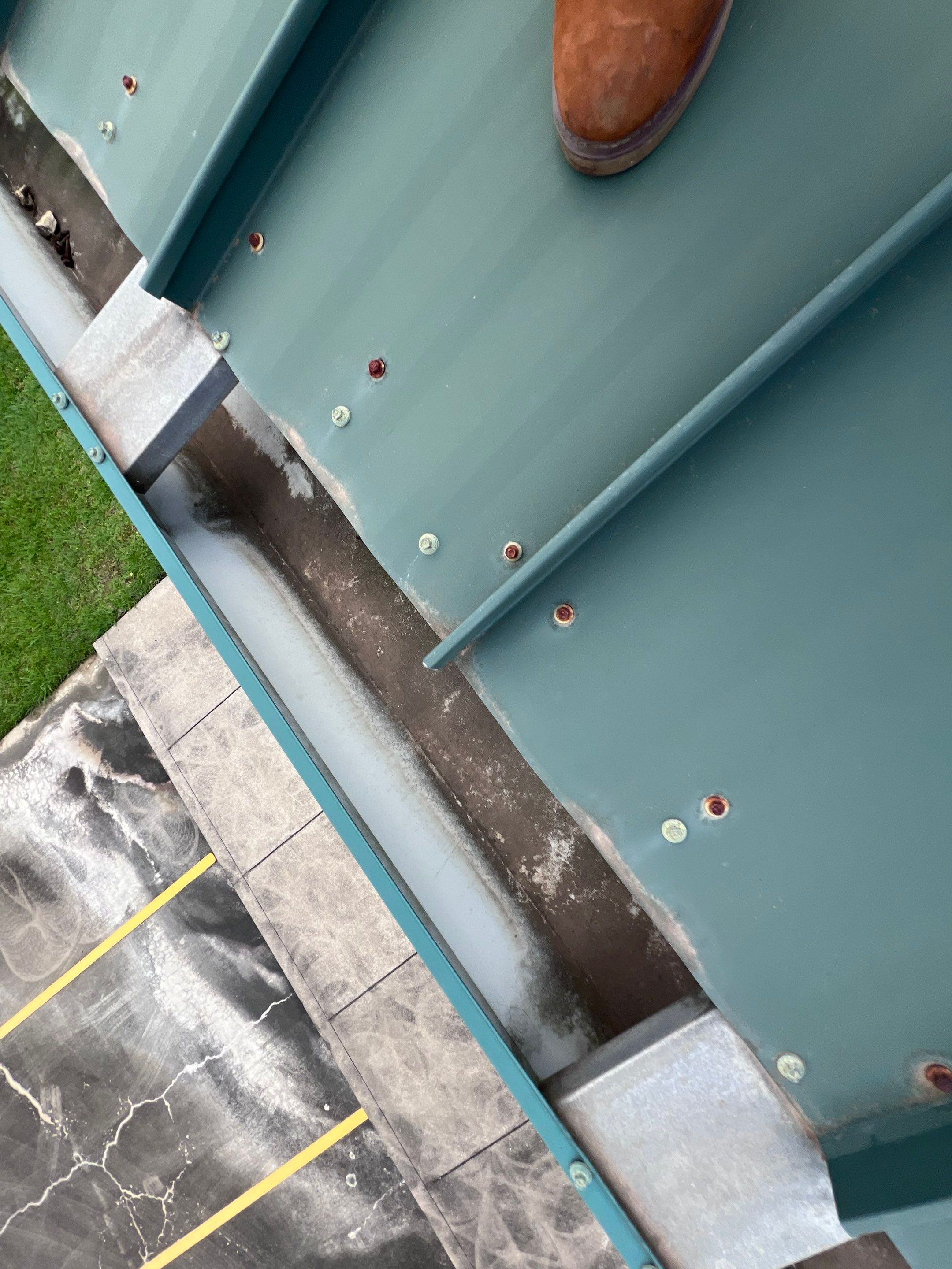 Hail Damage using Metal by Roof Repair Company