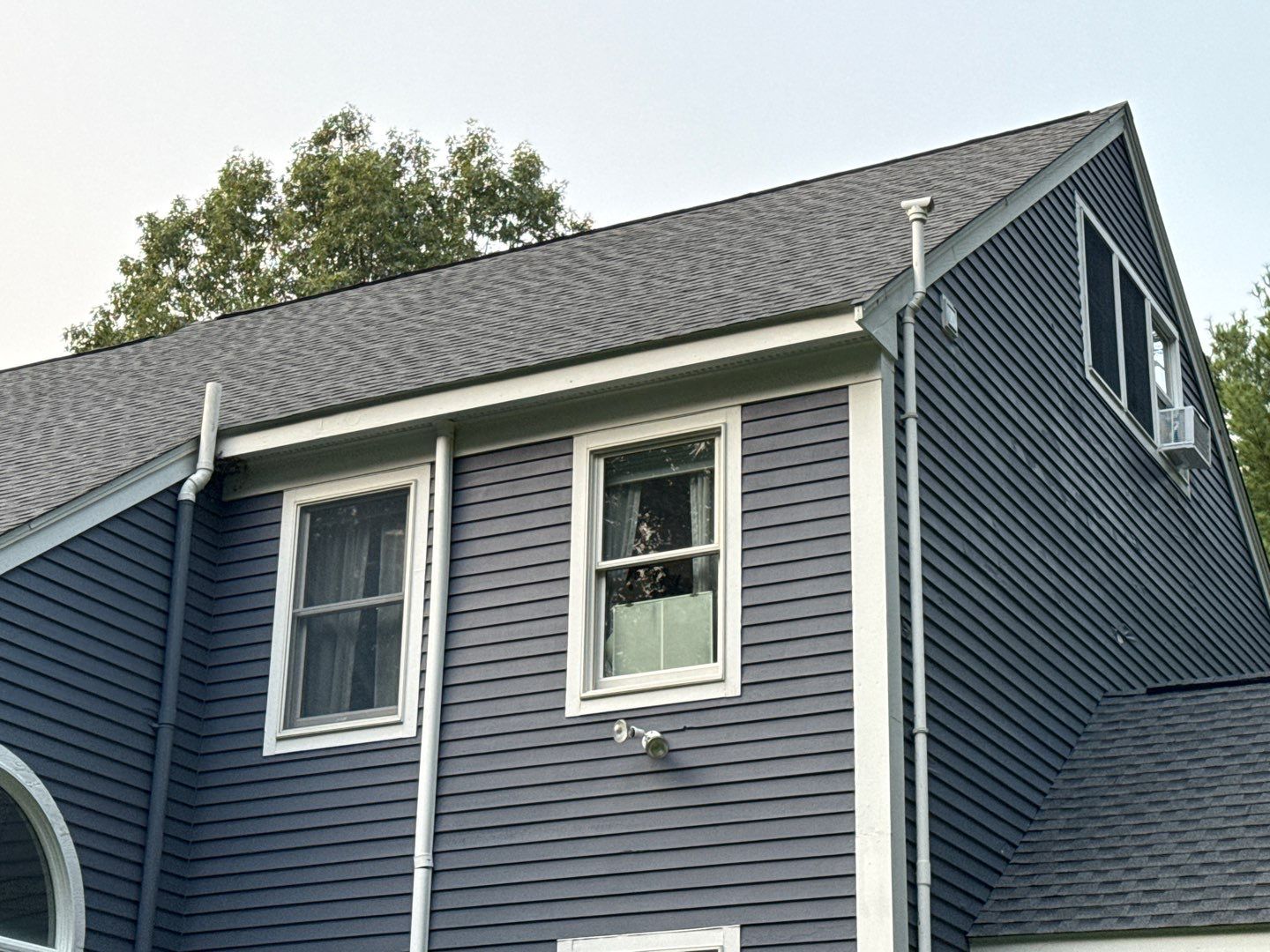 Solar-Ready Roof Replacement with GAF Pewter Gray Shingles & VELUX Skylights by Sensible Home Solutions