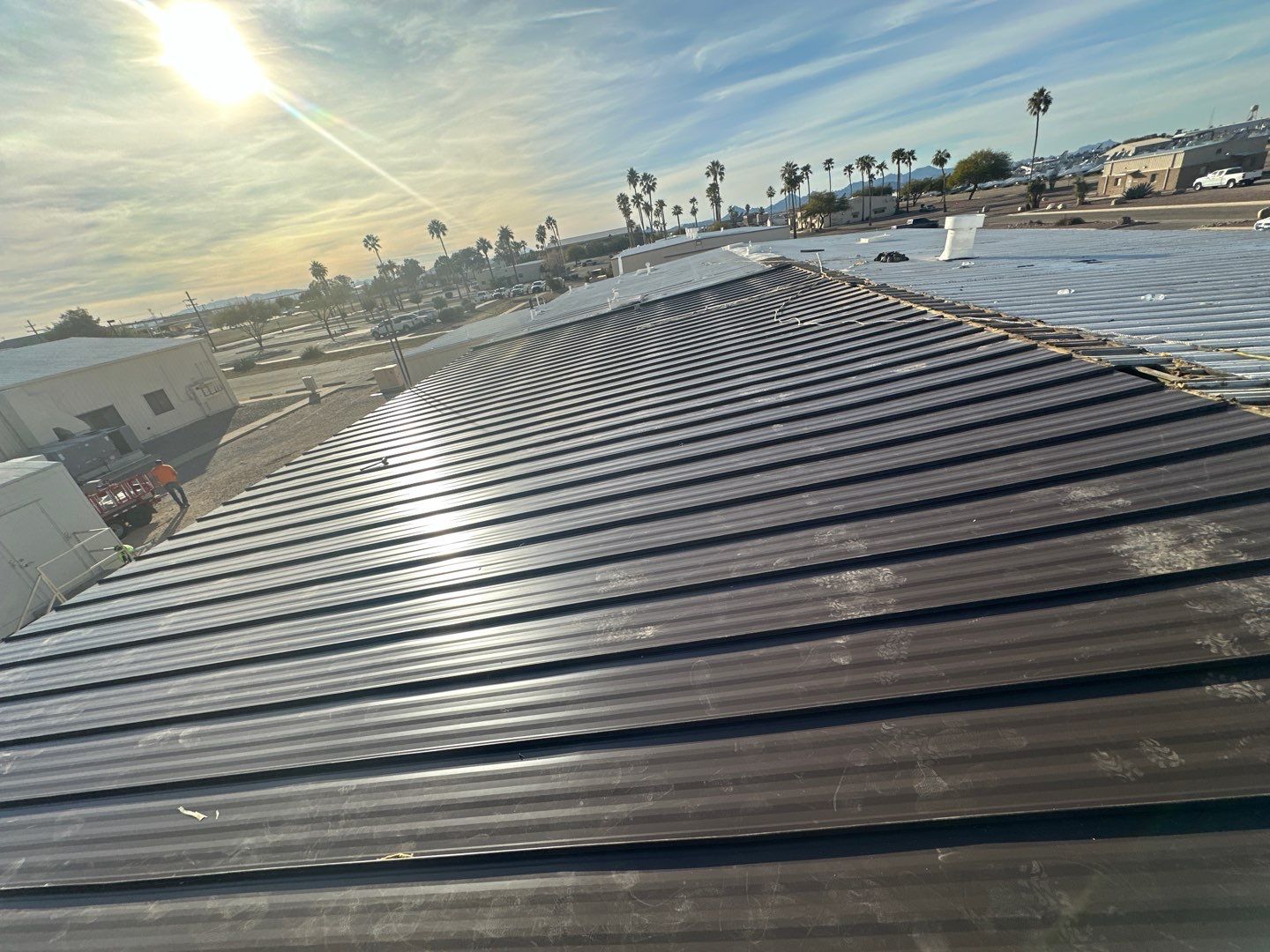 Burnished Exposed Fastener by Reimagine Roofing