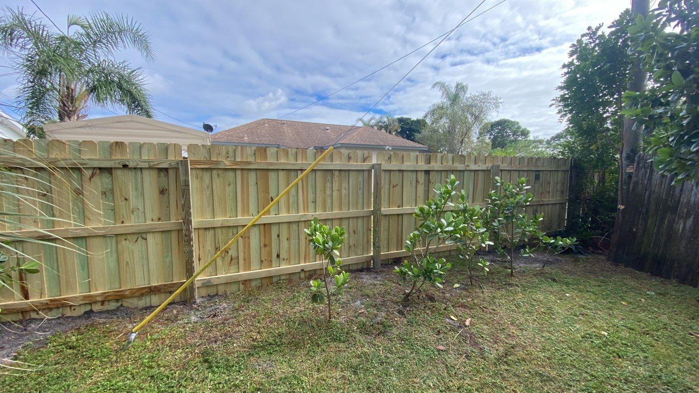 Wood Fence Installation using Board on Board Wood Fence by Asap fence and gates, LLC