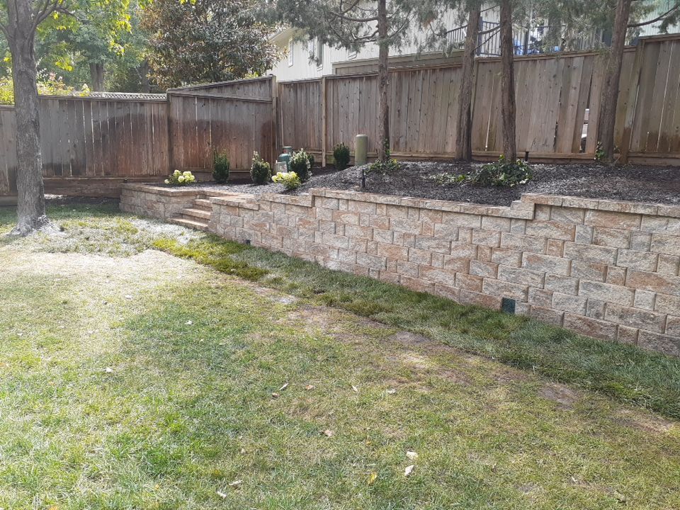Back Yard Harington Retaining Wall by LAND ESCAPES LLC