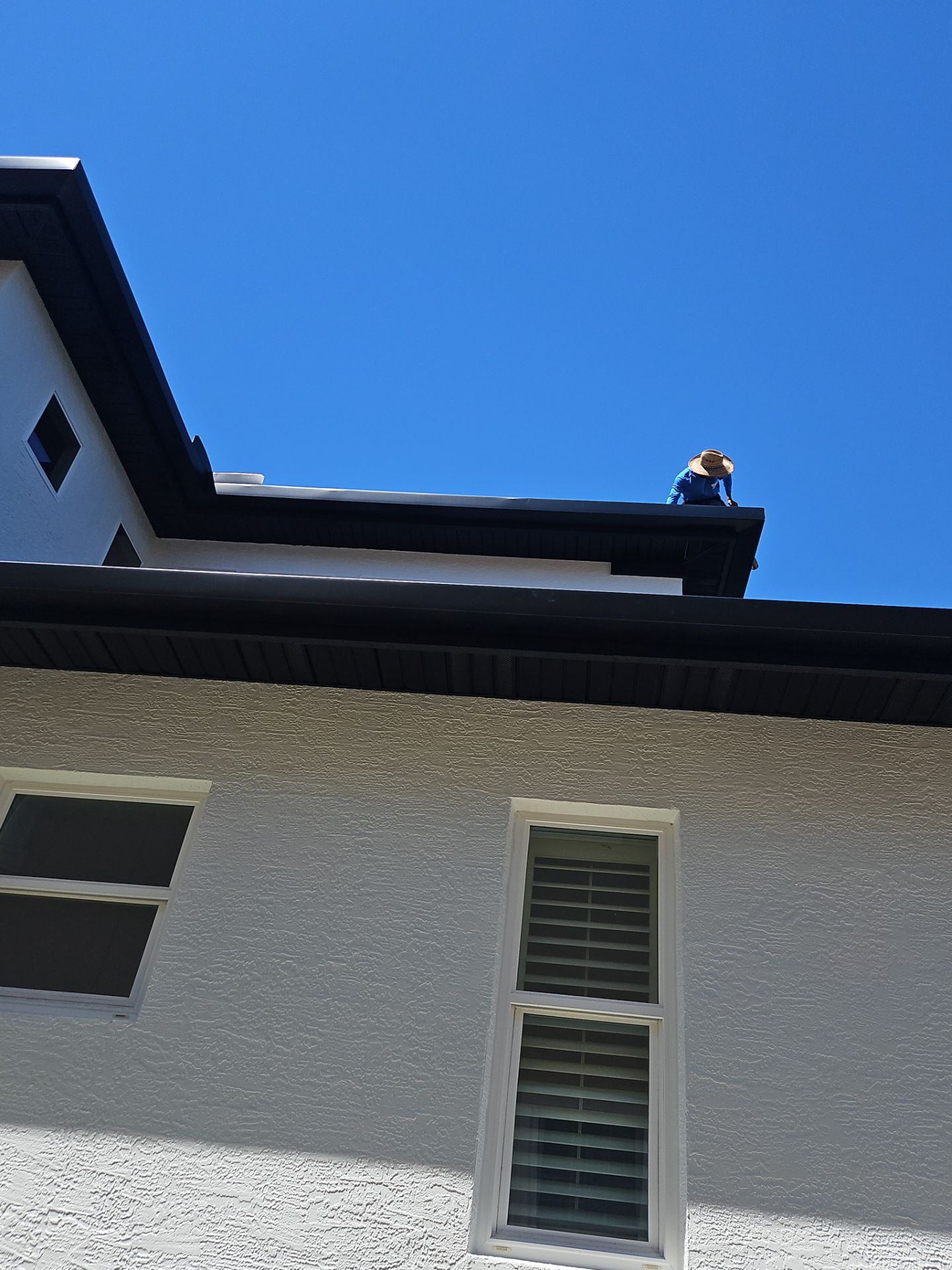 Soffit and Fascia Installation and black seamless gutters in Sarasota FL by Gutter Professors