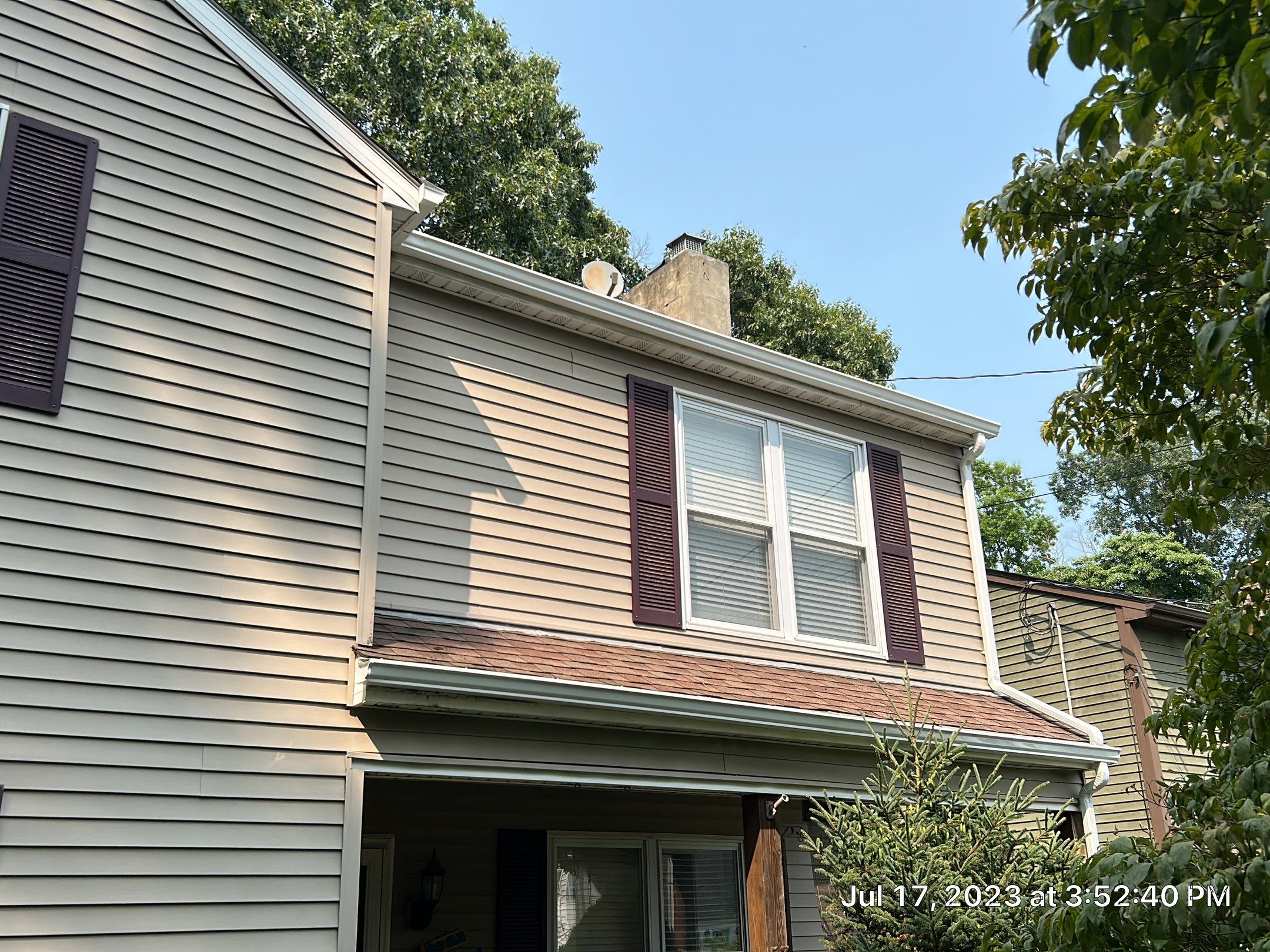 Gutter Installation using 5k White gutters by A Plus Exterior