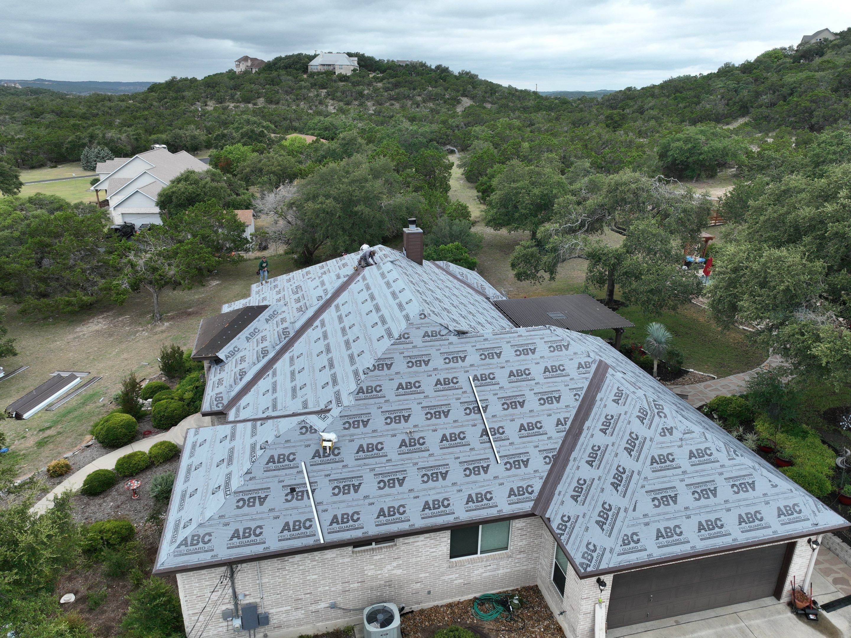 Residential Metal Roof Installation using McElroy Metal by Premier Roofing and Contracting