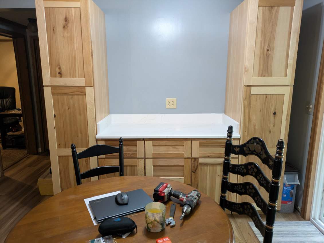 Stunning Kitchen Transformation with Raw Hickory Cabinets by A Step Above Handy LLC 