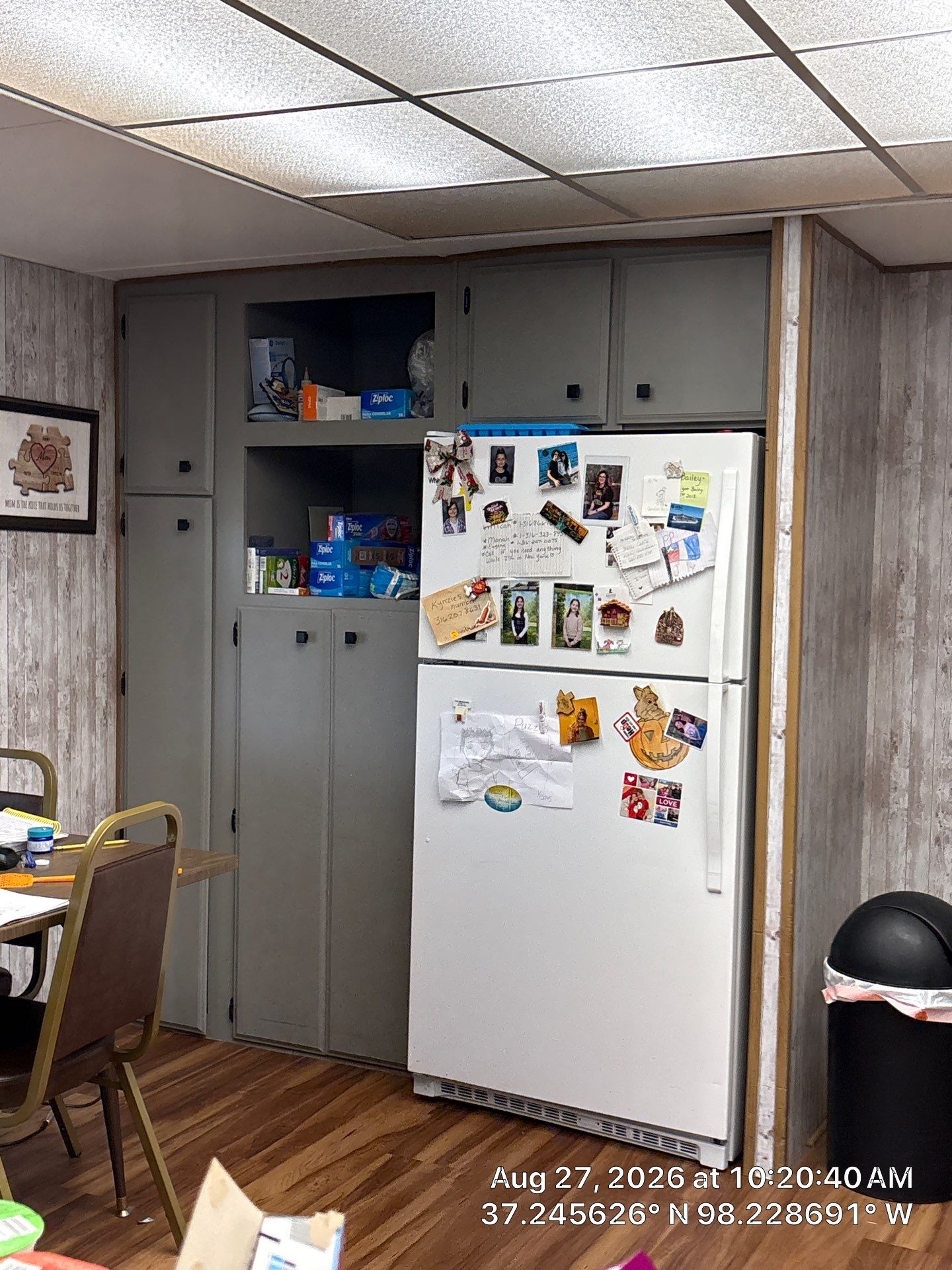 Kitchen Remodel Featuring Gray Cabinetry and Wood-Look Flooring by CompanyCam Sales Demo