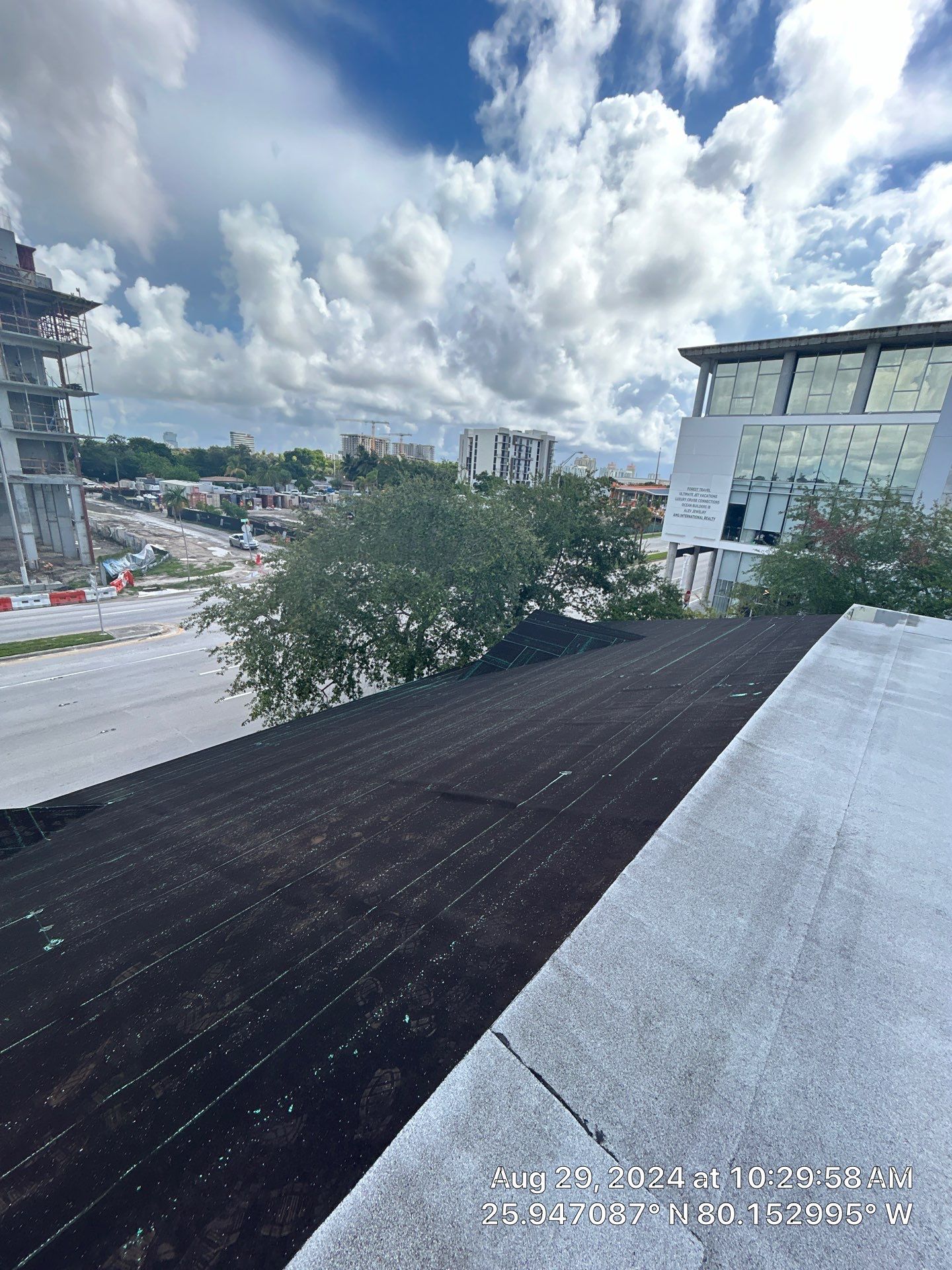 COMMERCIAL REROOF 24 GUAGE MEDIUM BRONZE 1-1/2" MECHANICAL SEAM "ZEBRA METHOD" by Earl W. Johnston Roofing 