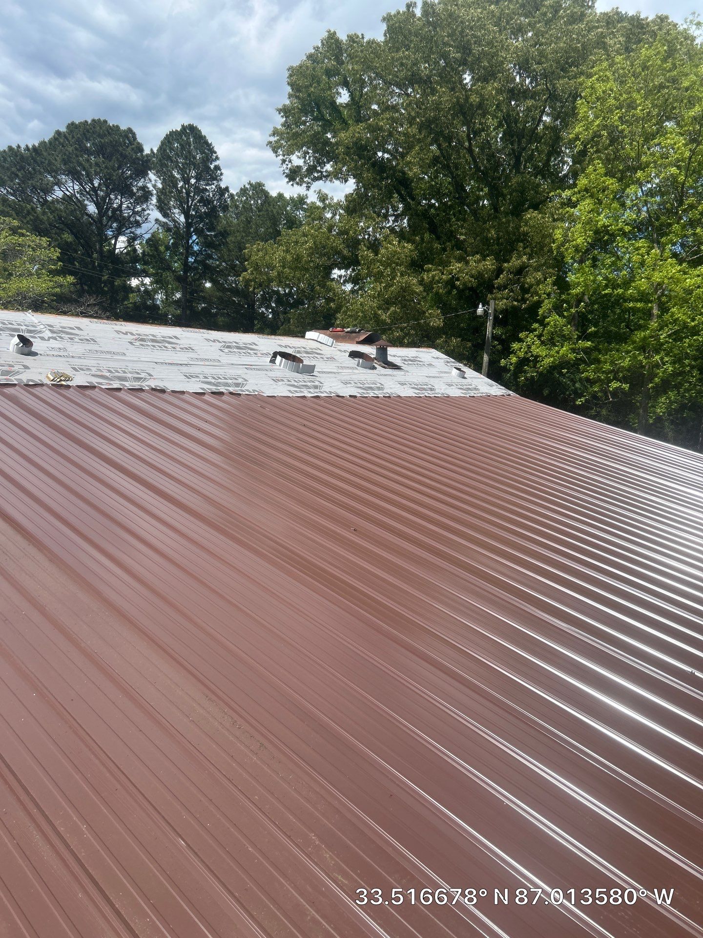 Metal Roof Replacement in Sylvan Springs (Brown) by The Roofing Dudes