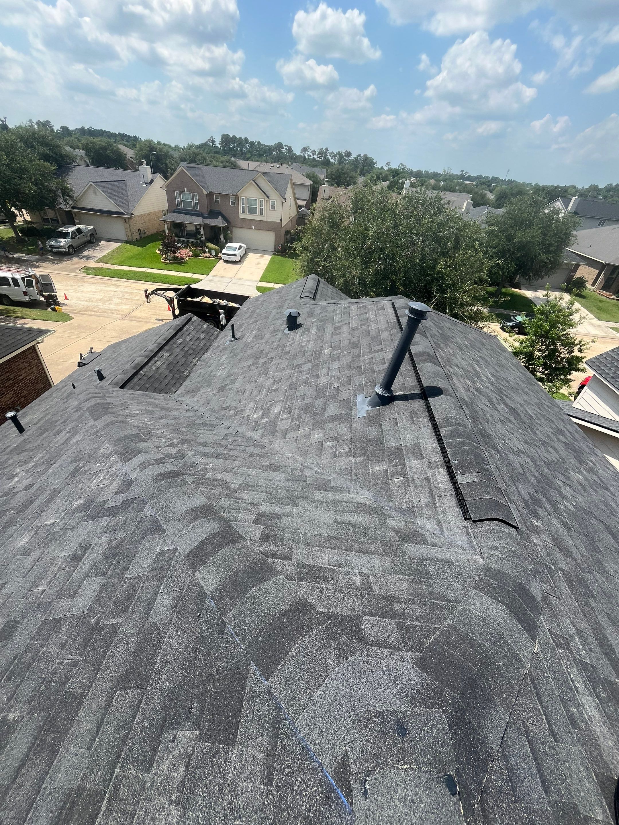 Residential Reroof and Exterior Window Project by Roofing Technologies Unlimited