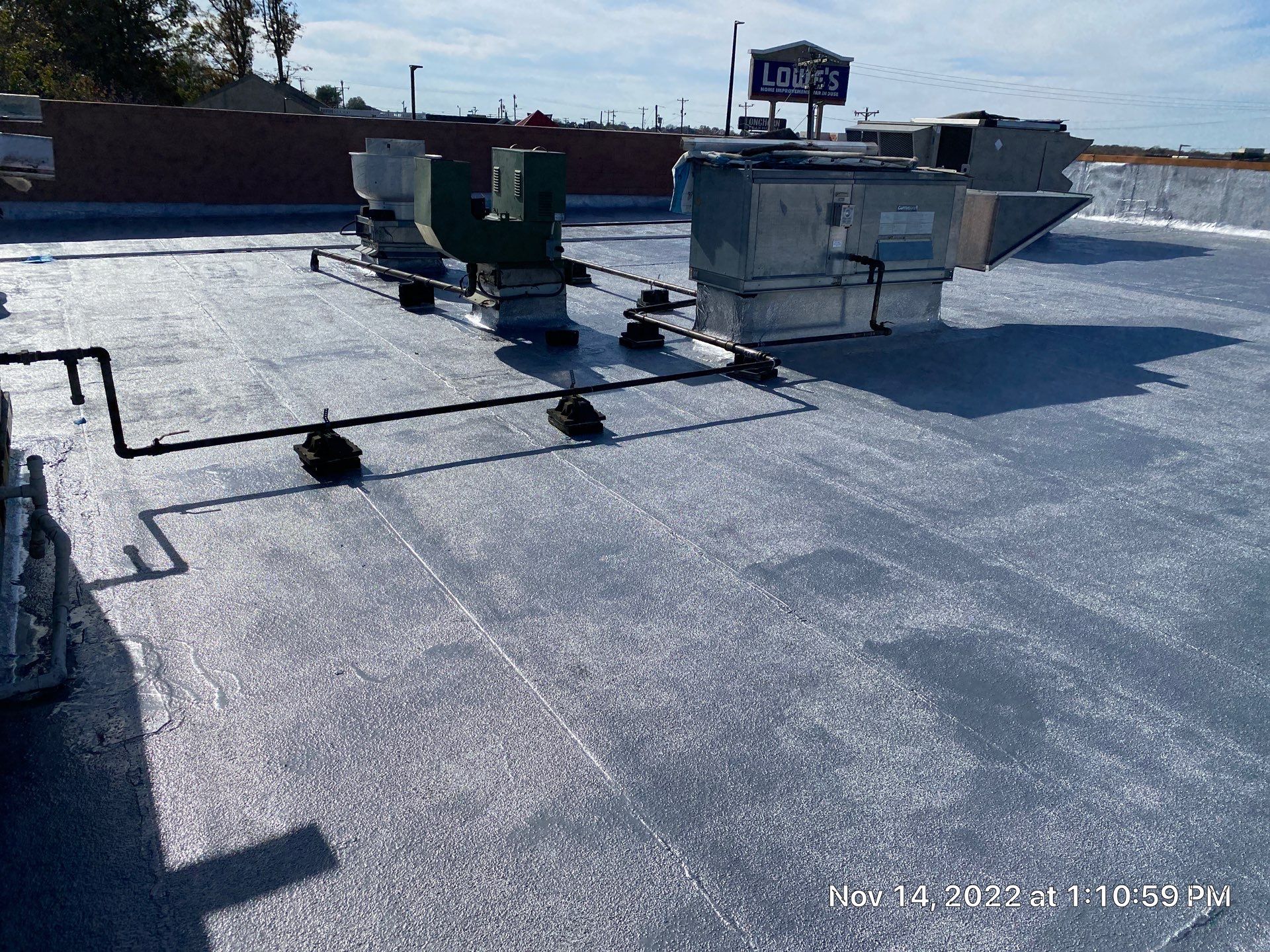 Commercial Coating using Poly Urerthane and Silicone Coating by Just In Time Roofing and Restoration