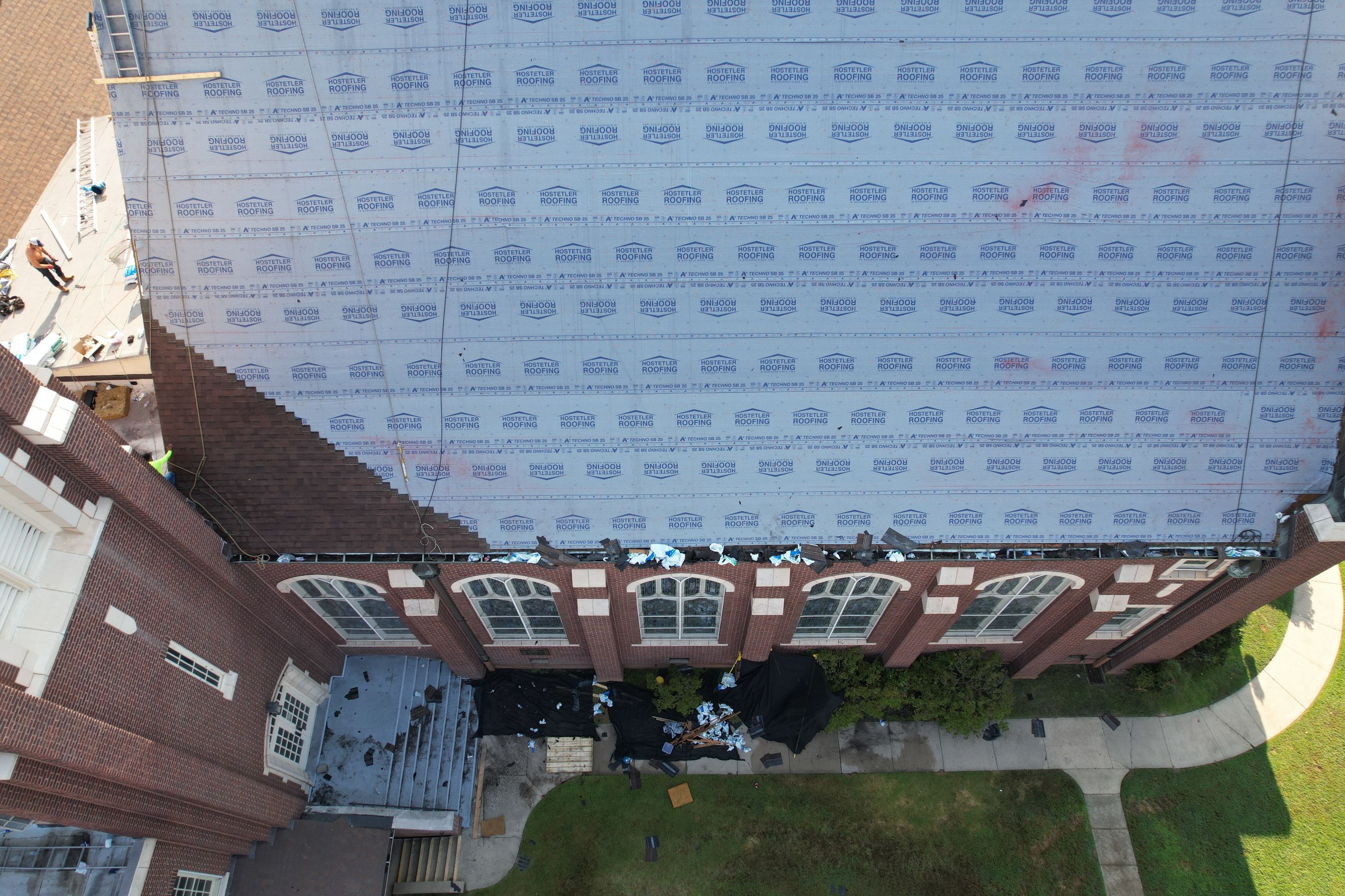 Commercial Roof Replacement using Malarkey Vista Shingles and 50 mil PVC by Hostetler Roofing