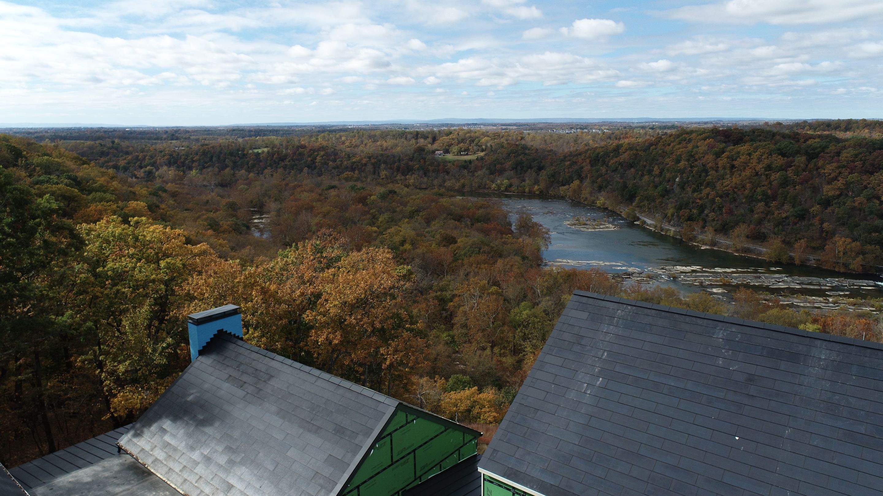 Roof Installation using Tesla Solar Roof V3 by American Home Contractors
