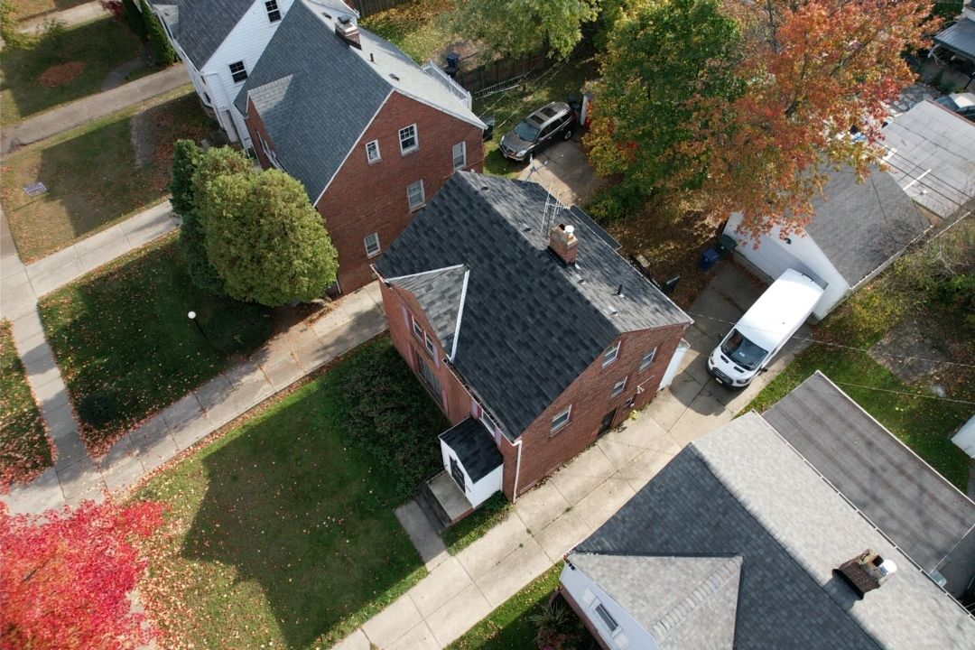 Storm Restoration - Roof Replacement using GAF Timberline HDZ Golden Harvest in Cleveland Heights by Atlas Roofing & Restoration