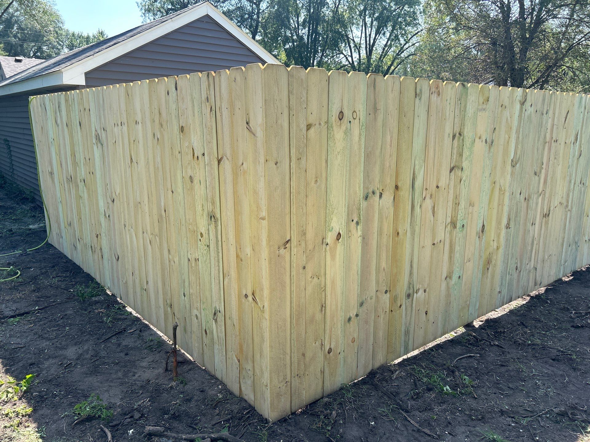 Treated Pine Privacy and Picket Fence Installation in Evansdale by Perfect Picket Fence and Stain