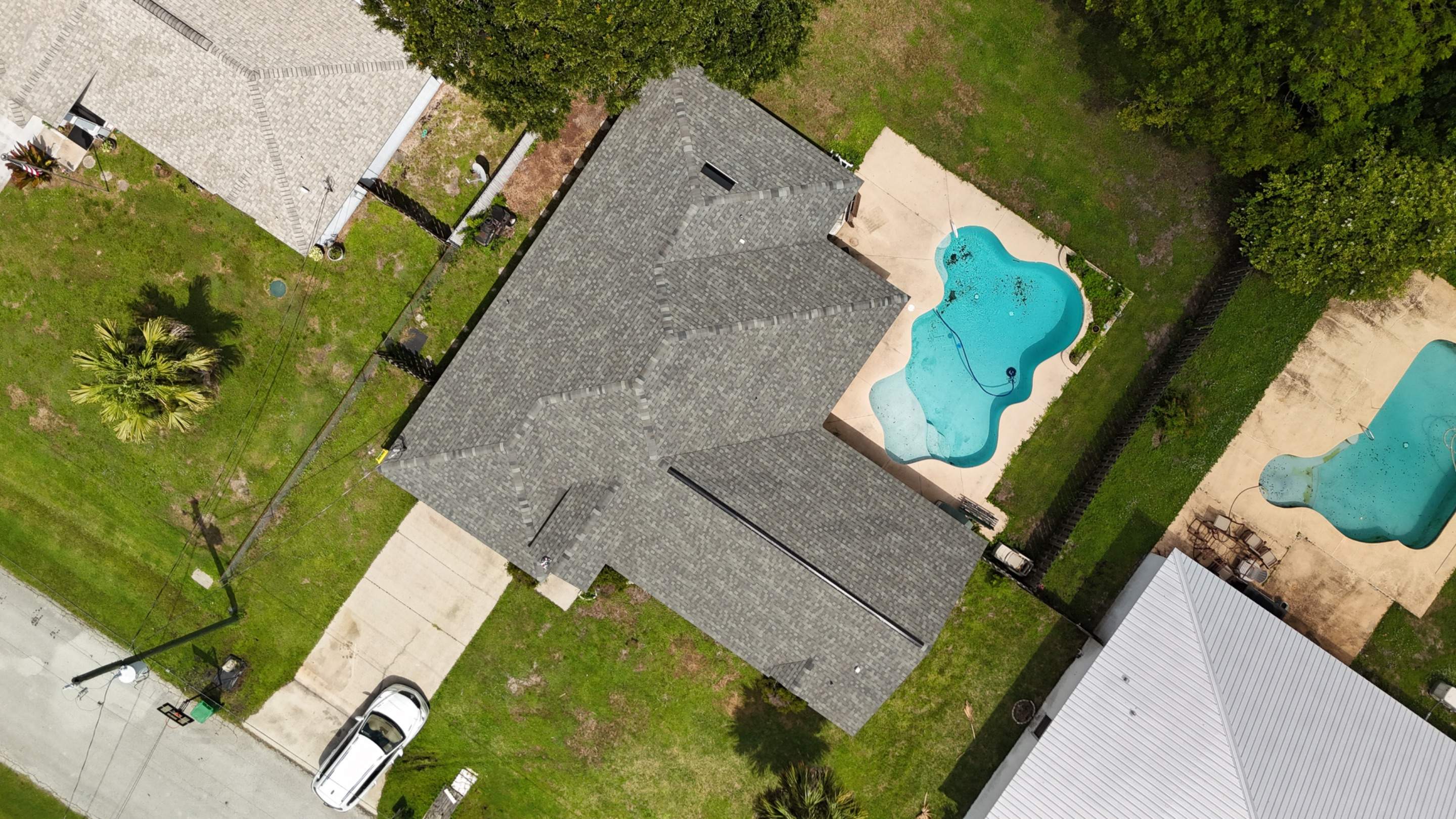 Port St. John Roof Replacement Featuring Tamko Titan Oxford Gray Shingles by Wiedmann Construction & Roofing
