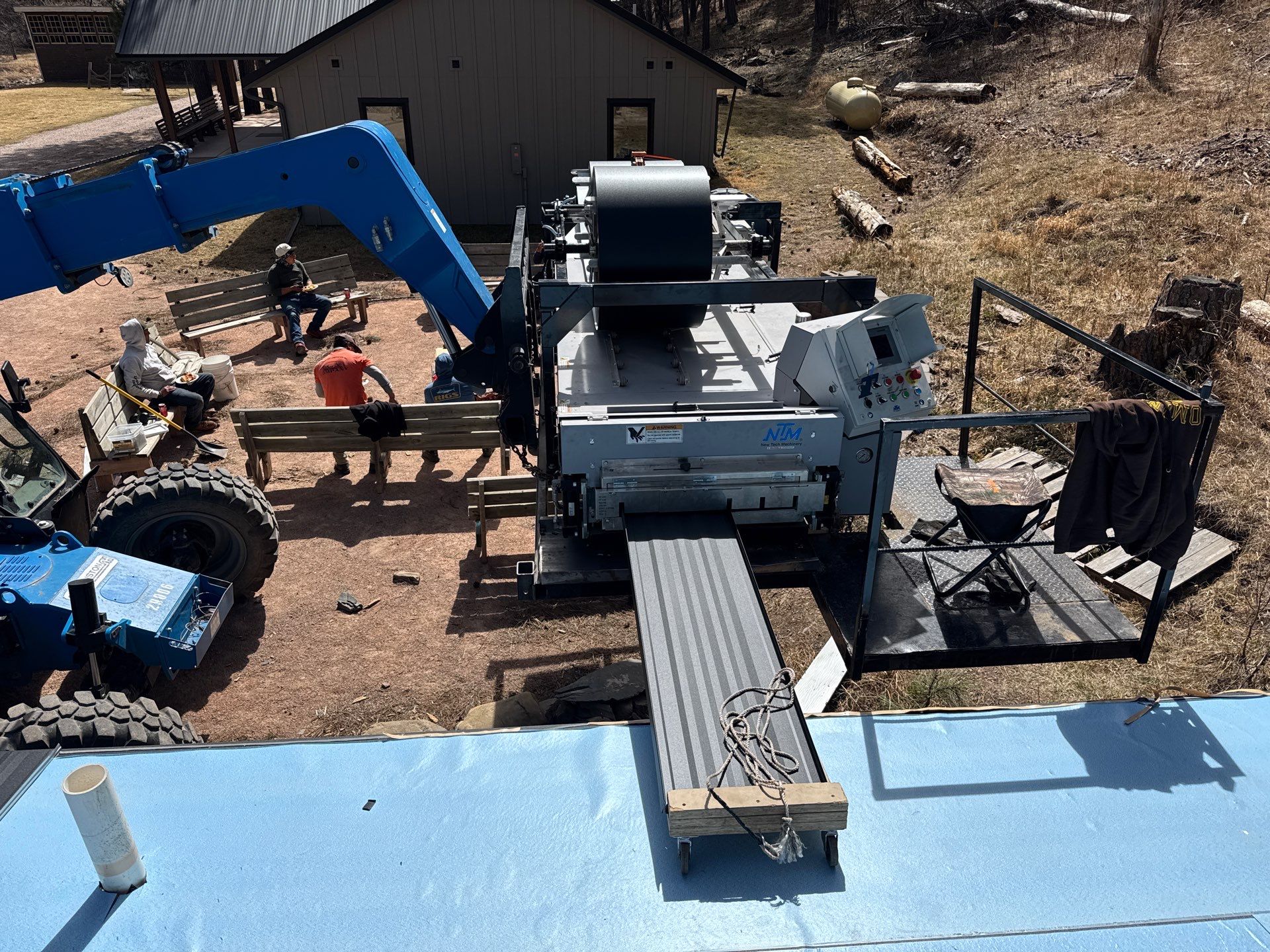 Residential Roofing Installation using Steel Roofing by Weather-Tite Exteriors LLC