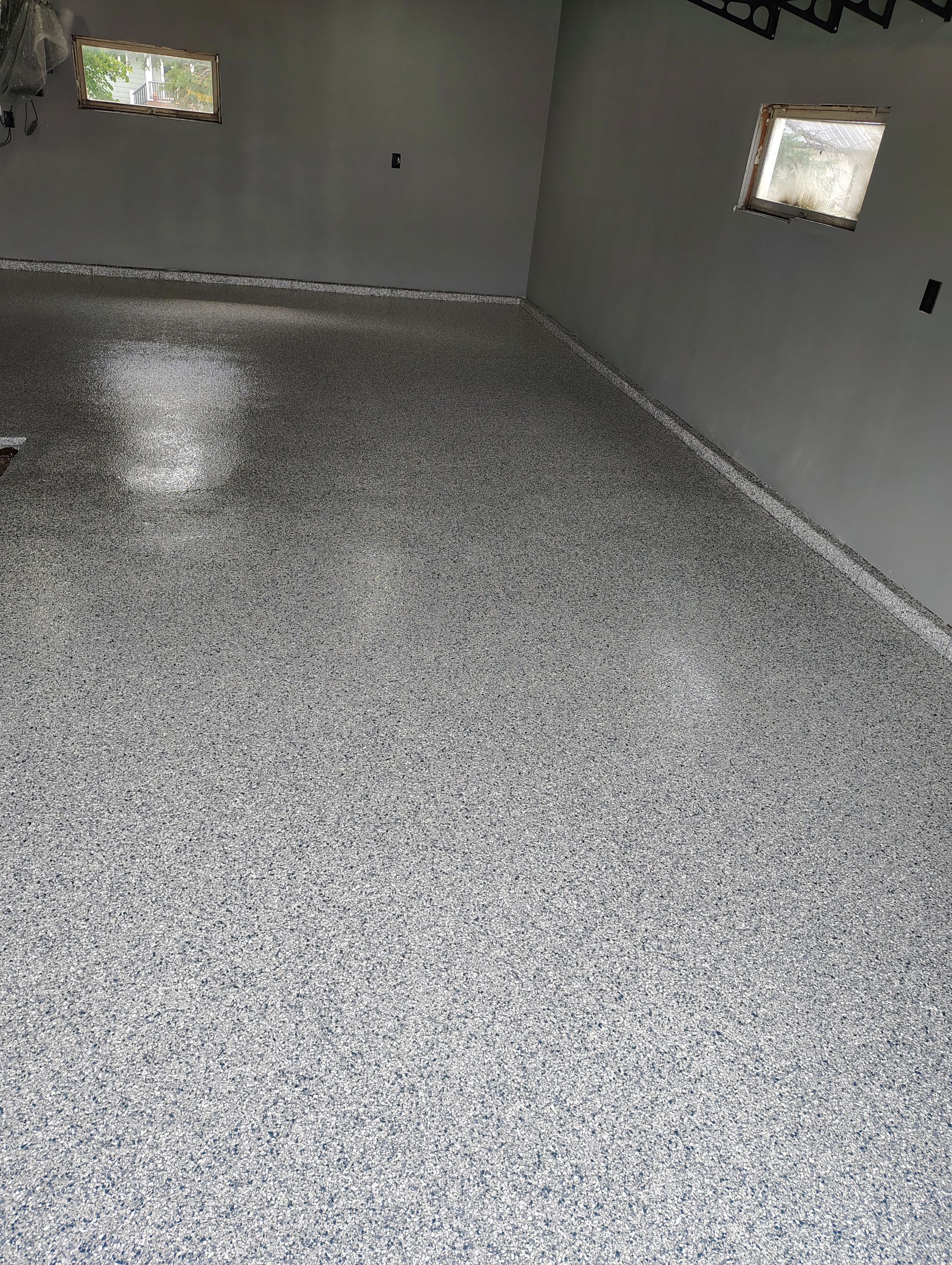 Garage Floor Concrete Coating and Surface Restoration in Colman by Select Painting, Coatings & Garage Cabinets