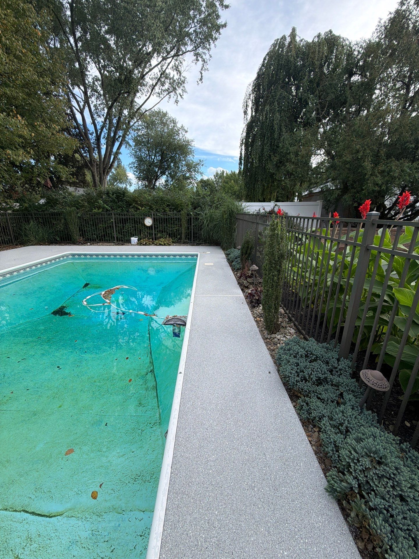 Blue Granite Pool Patio Concrete Coating in Lincoln Park by Spectrum Painting, LLC