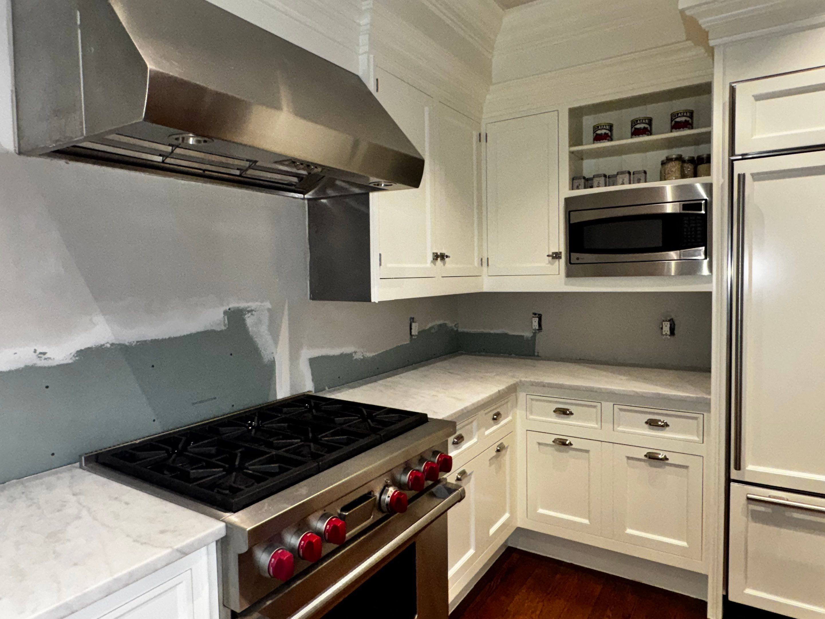 Water Damage Repairs in Luxury Kitchen and Primary Bathroom by Fox Hill Luxury Real Estate Services