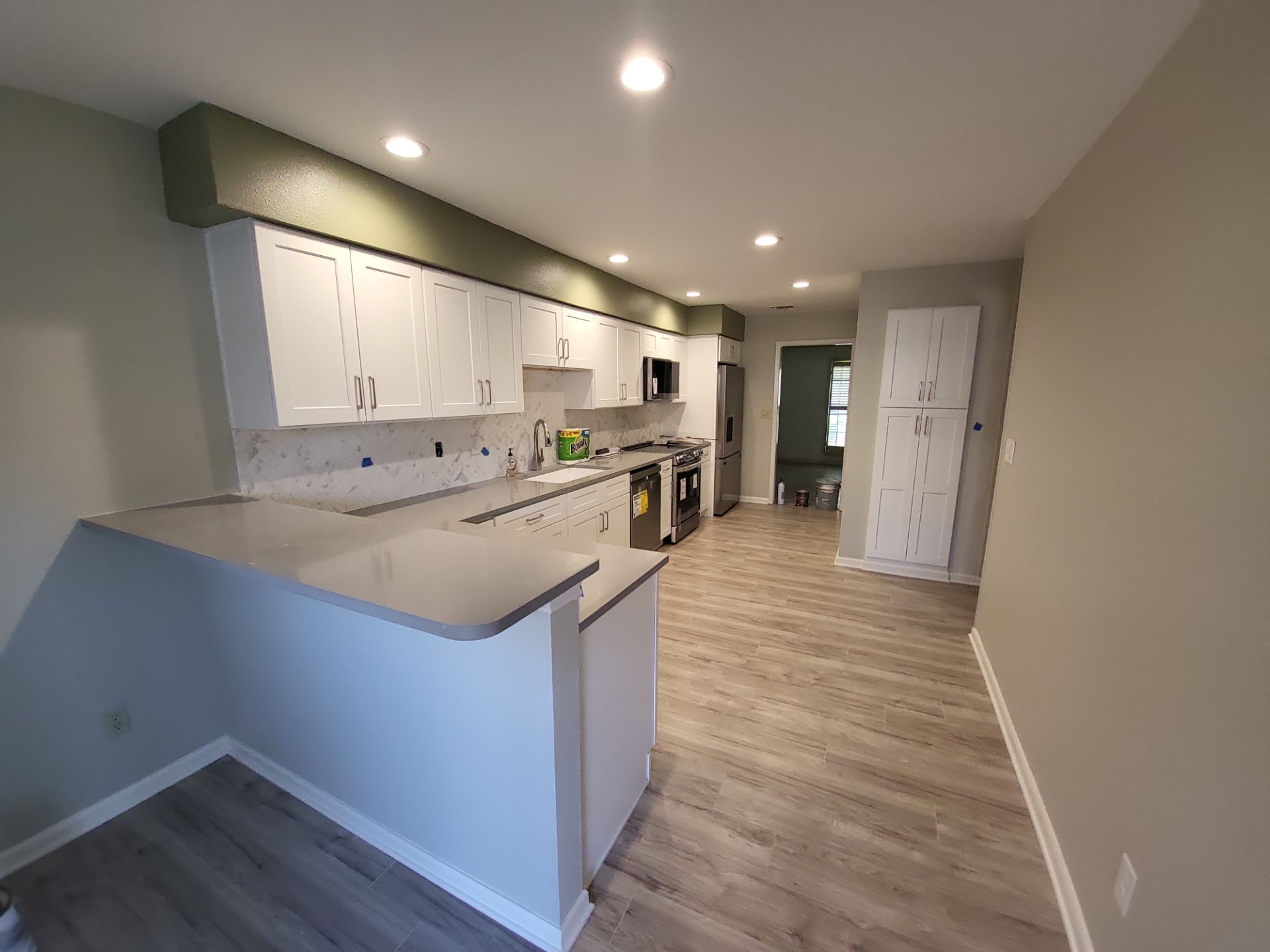 L-Shaped Kitchen Remodel by Legacy Bath and Kitchen 