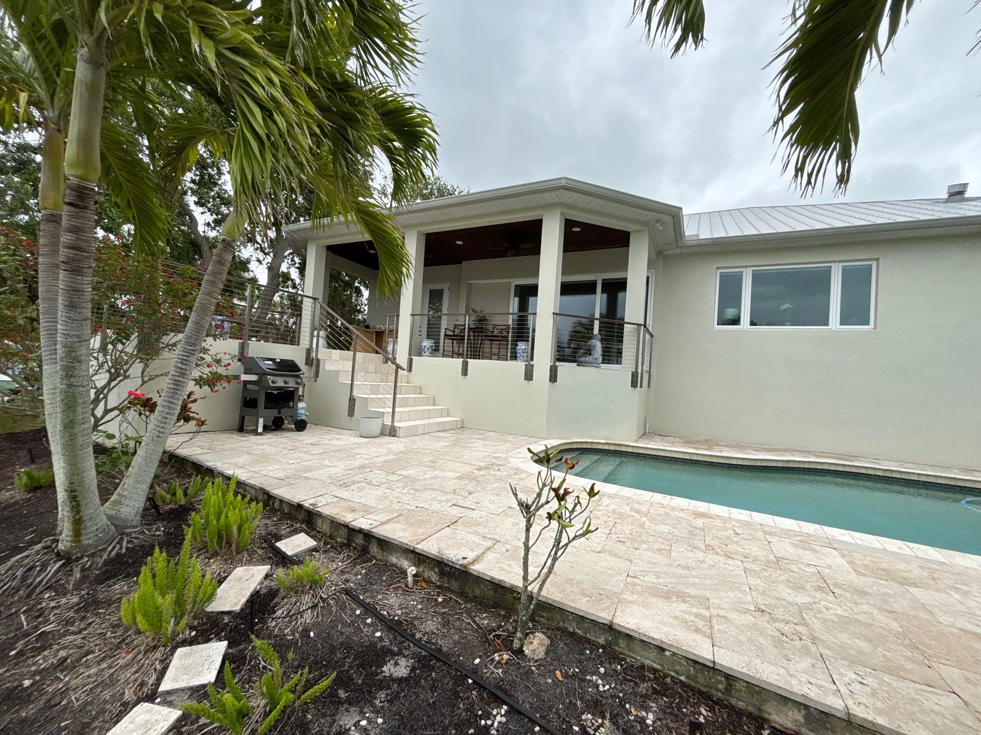 6-Inch White Seamless Gutters Installation in Siesta Key FL by Gutter Professors