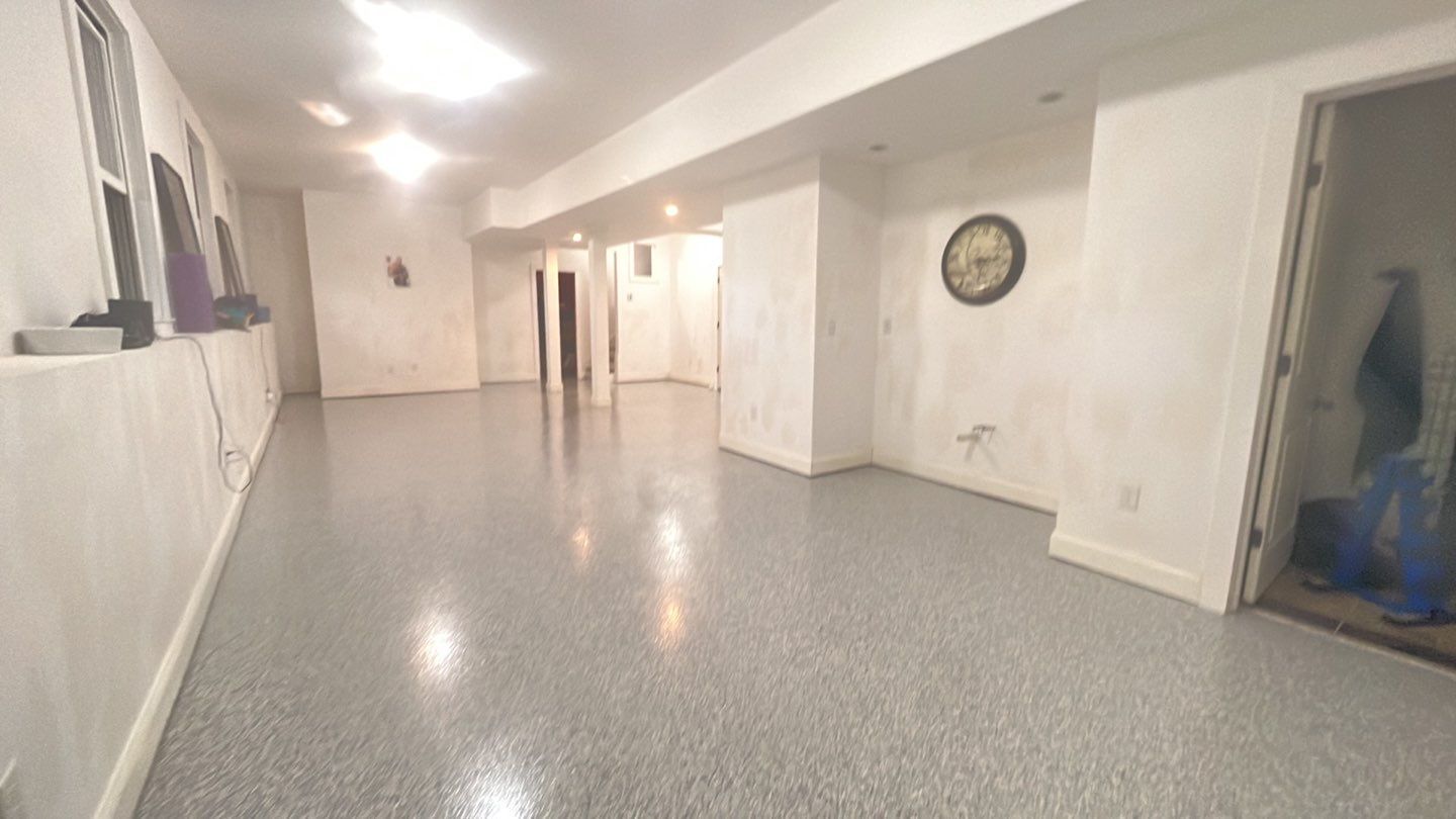 Rommel family Basement TransFLOORmation by Symphony Concrete Coatings