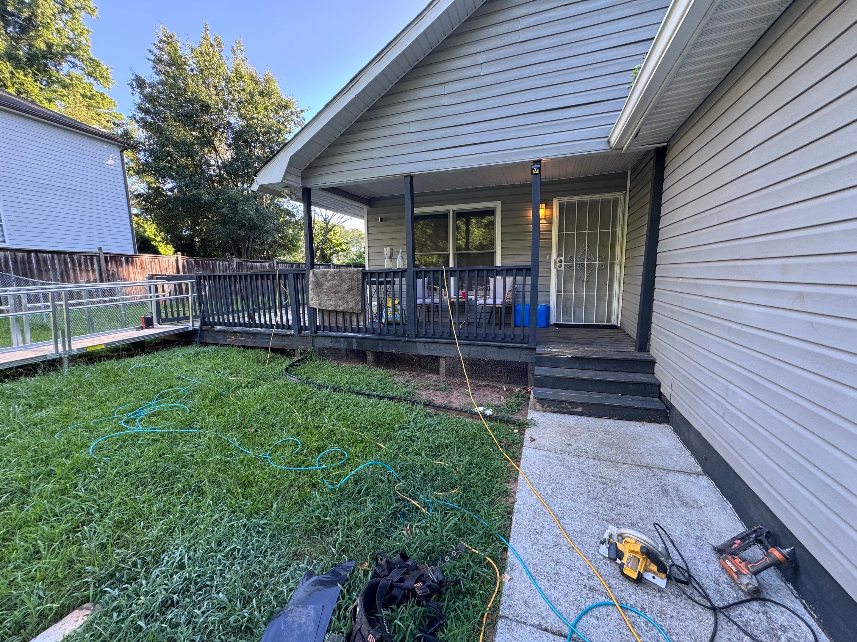 Deck Refinishing and Exterior Painting with Custom Green Finish in Decatur by Swift Home Renovations
