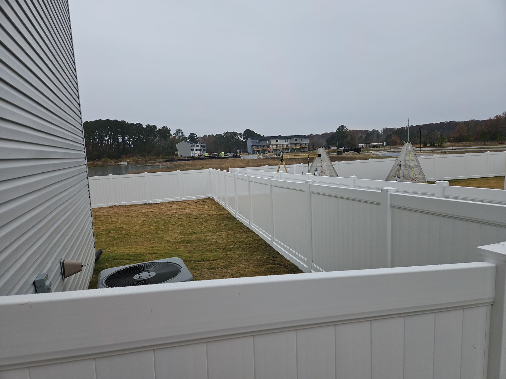 A Perfect Fence for a Brand-New Home by Tidewater Fence