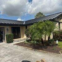 24ga 1.5" Mechanical Seam Dark Bronze by Total Roofing System The Metal Roof Experts